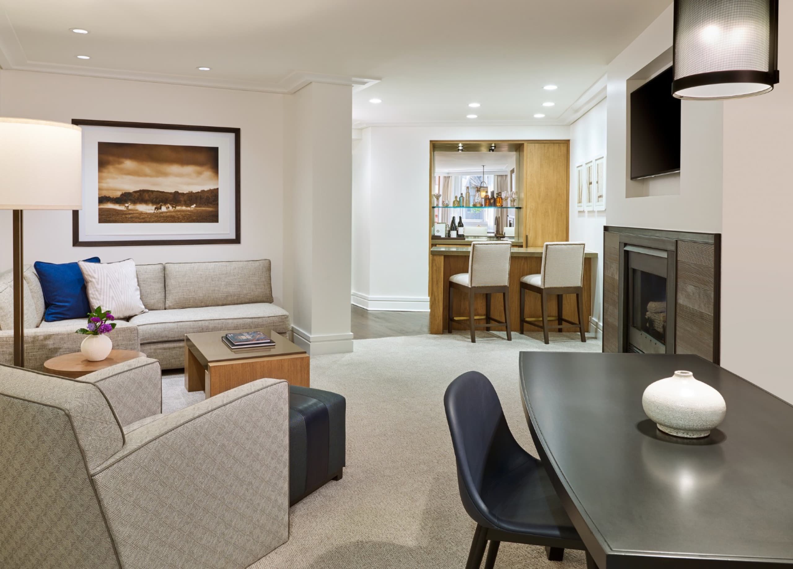 One-Bedroom Mountain-Side Suite living room with wet bar and fireplace