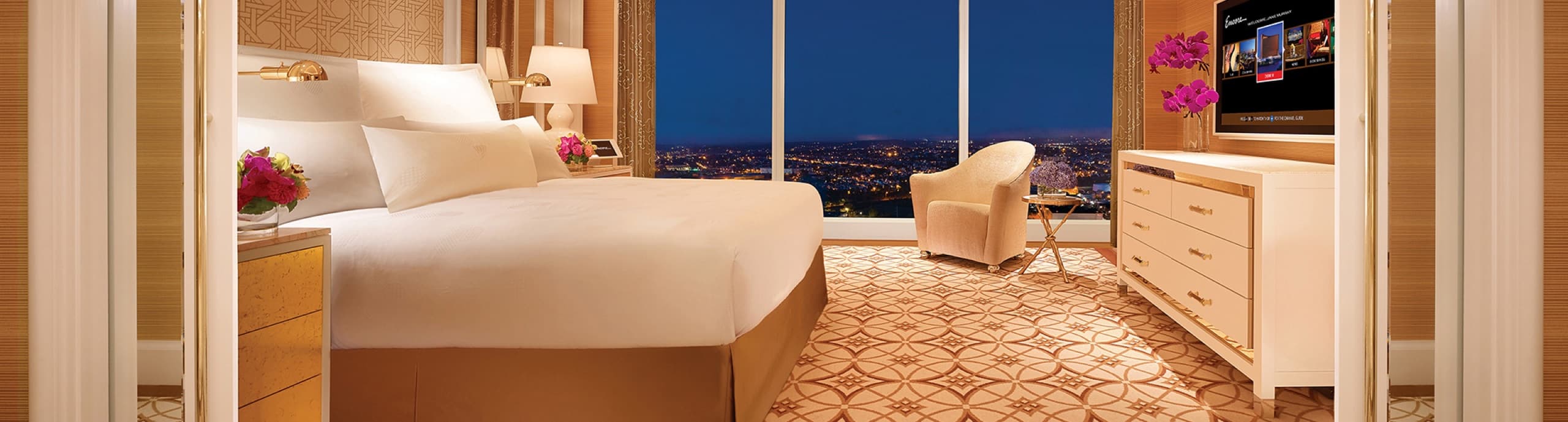 Signature Suite bedroom with skyline view