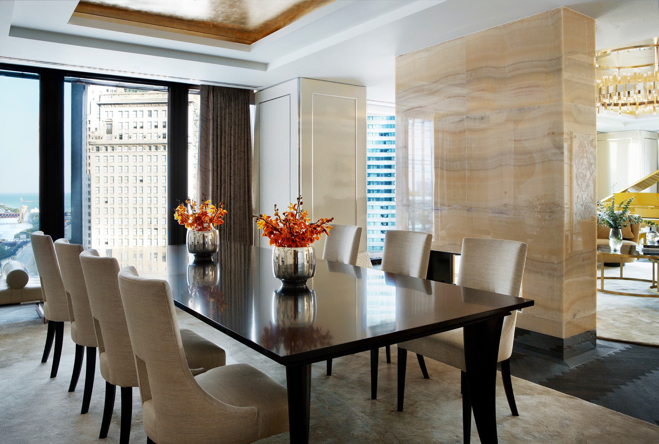 Infinity Suite — parlor with grand piano and gold-leaf ceiling