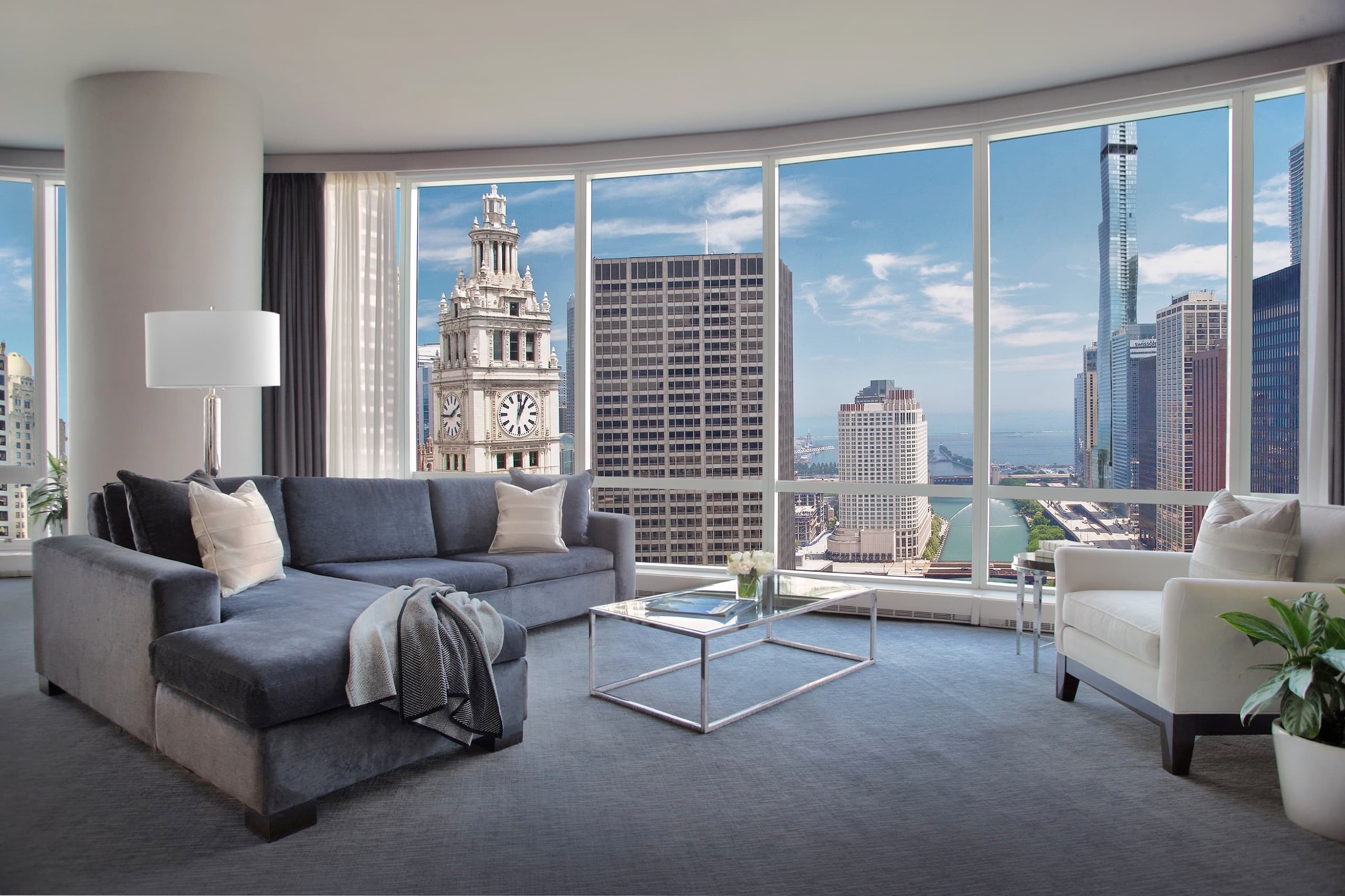 Grand Deluxe Lake View One-Bedroom Suite living room, Wrigley Building and lake beyond