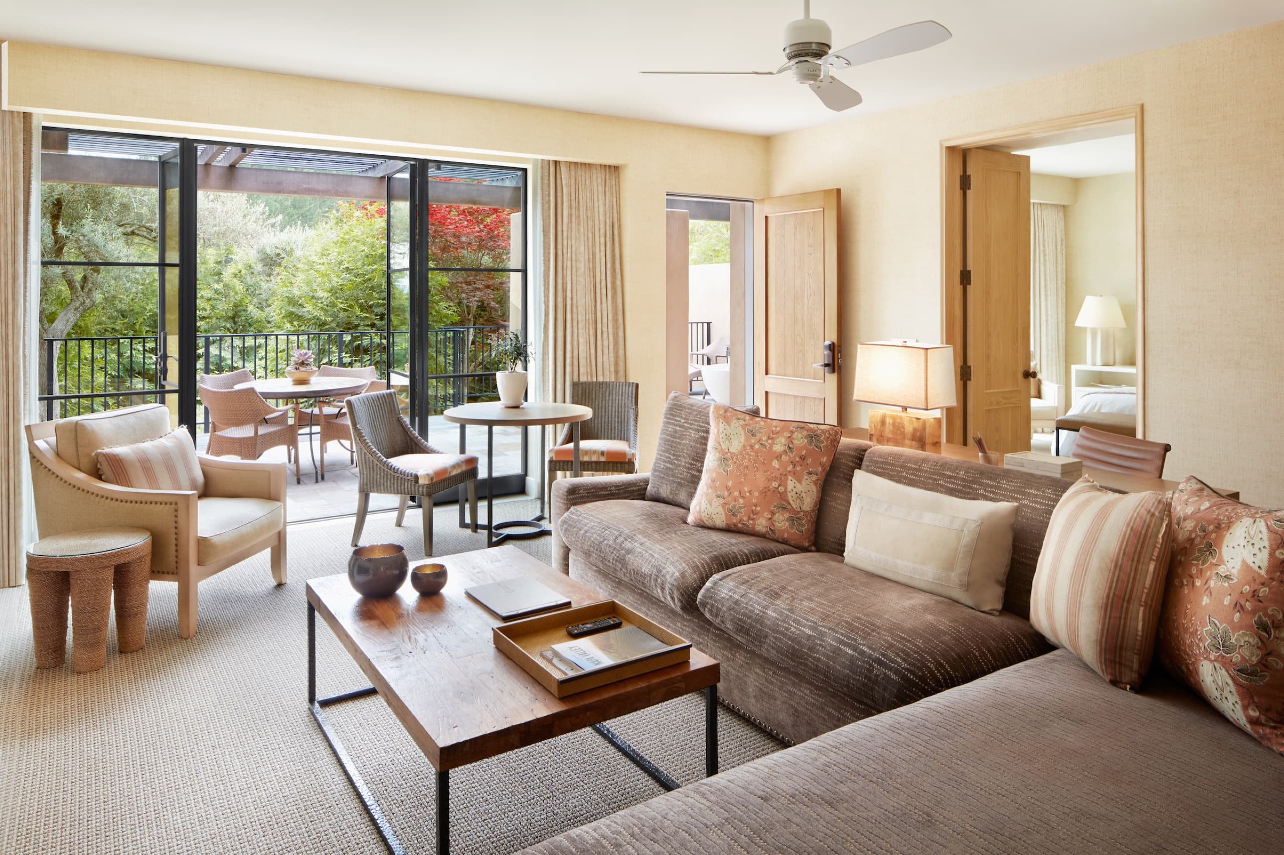 Deluxe Suite living room opening to the terrace