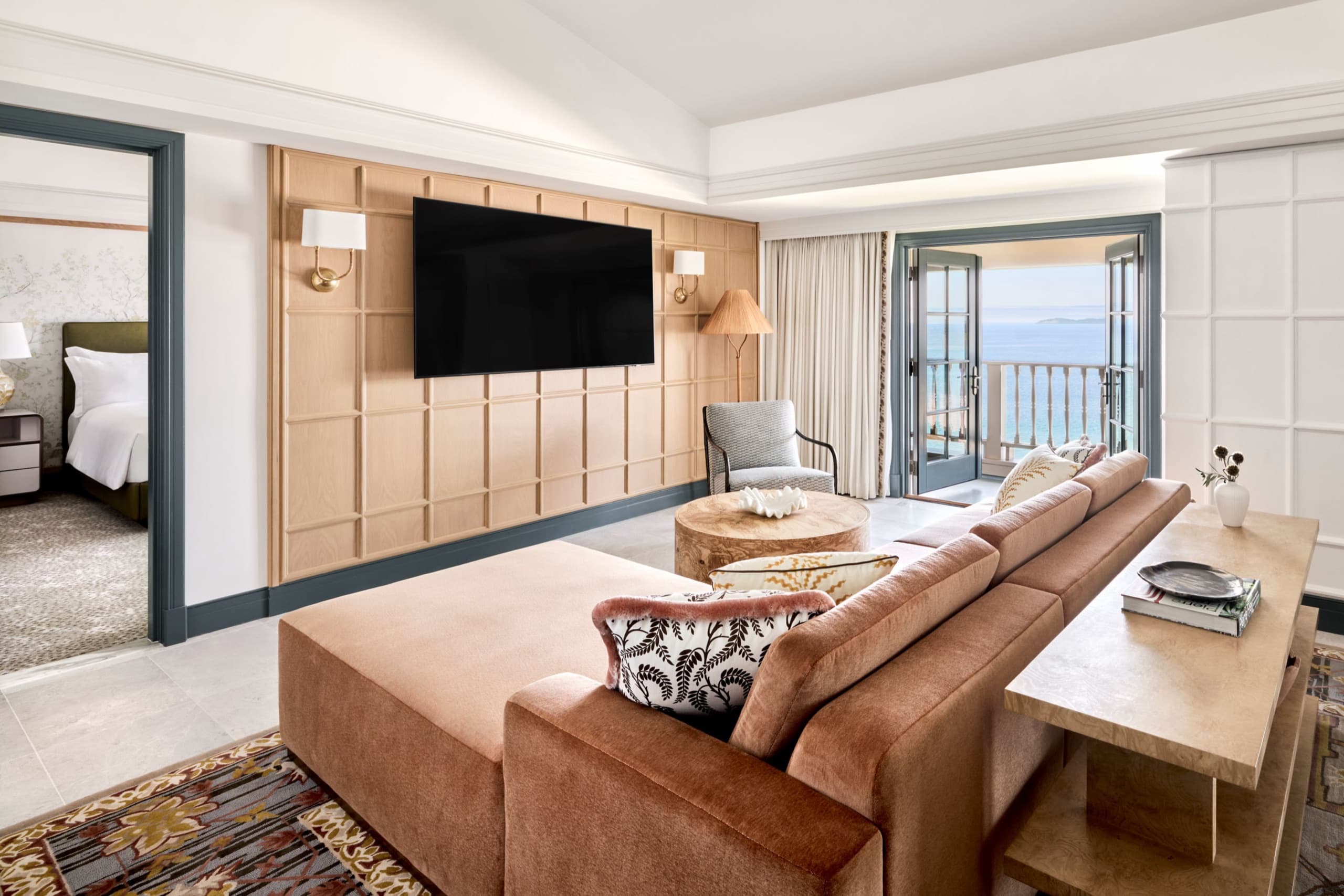 The Ritz-Carlton Suite living space with ocean-view balcony