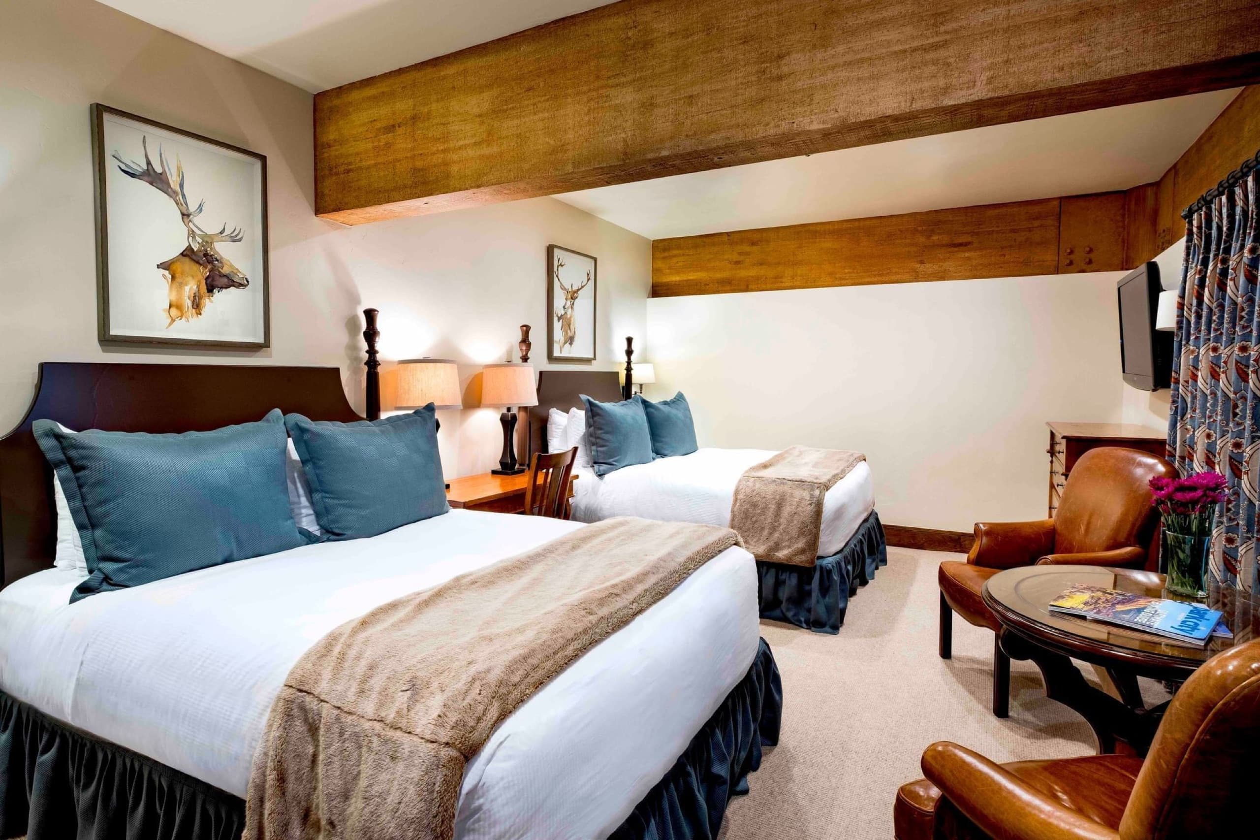 Deluxe King bedroom with gas fireplace and fur throw (room 172)