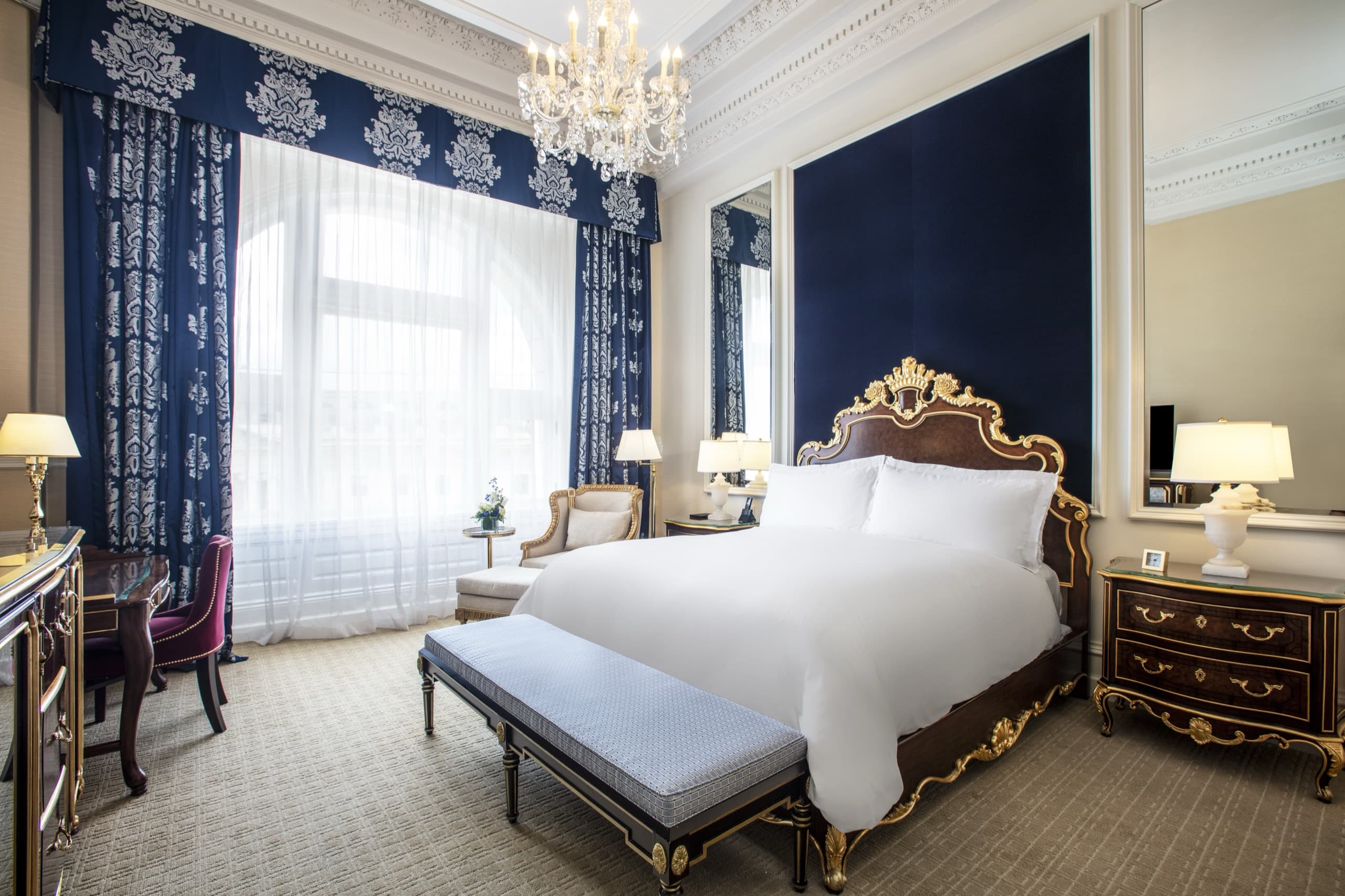 Deluxe King guest room with soaring original windows