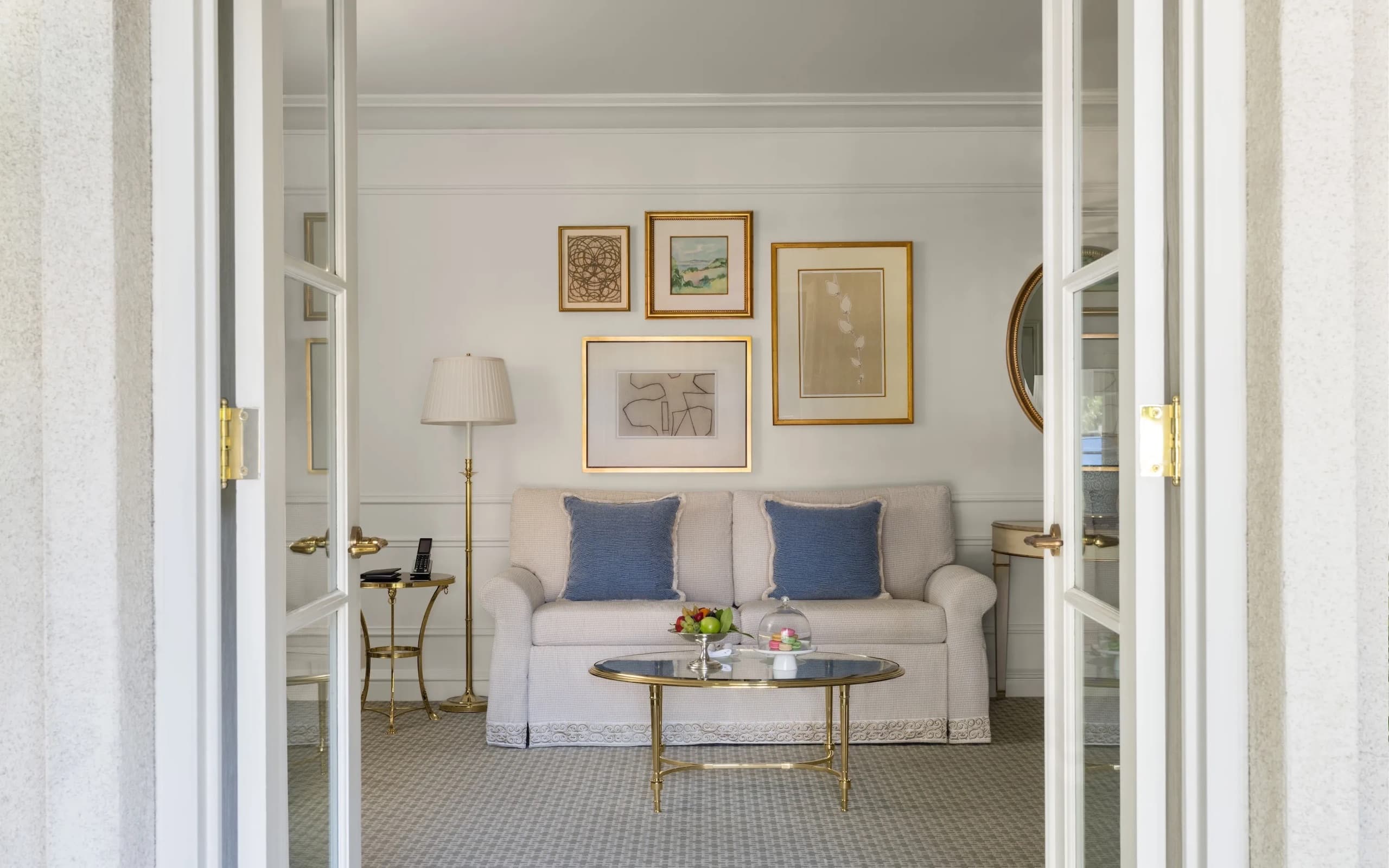 Royal Patio Suite - private wraparound terrace with lounge seating and chaises, daytime