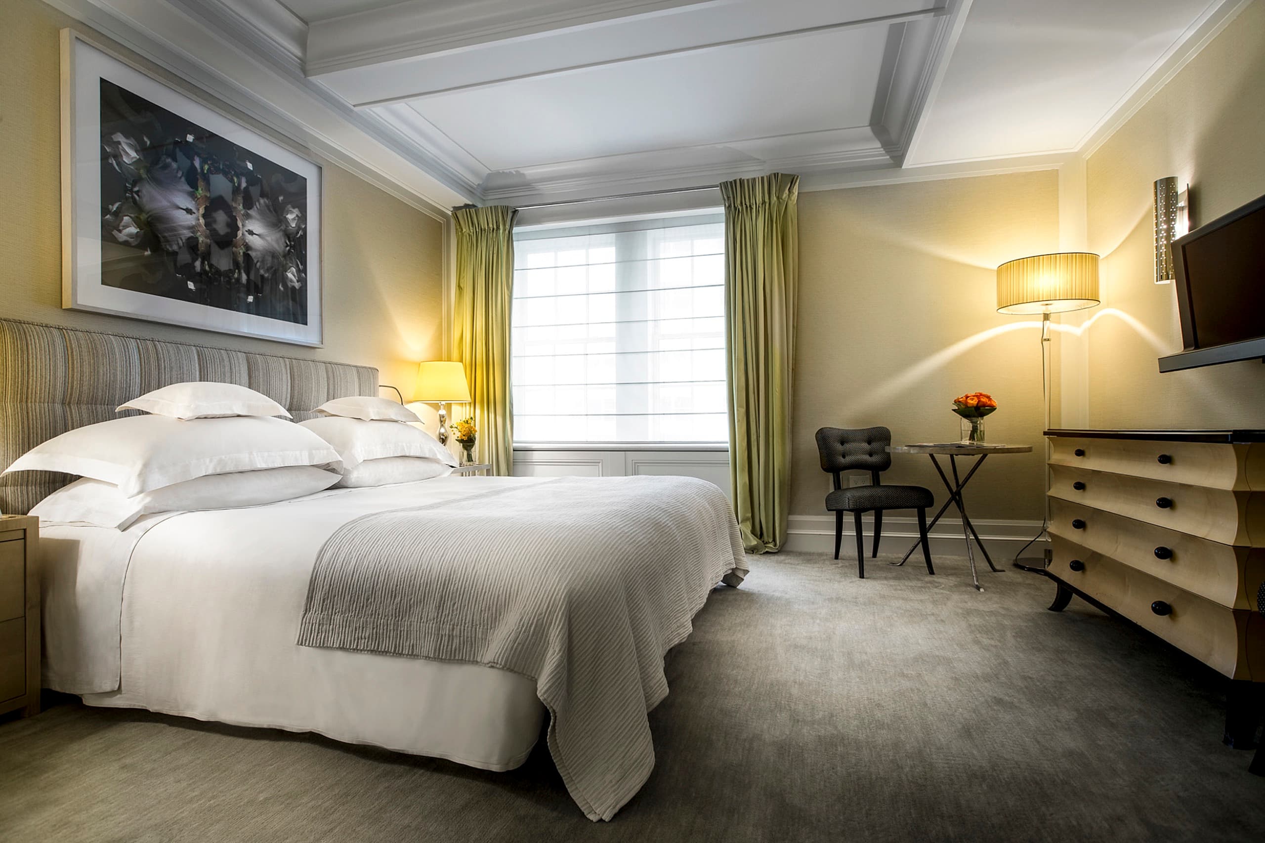 Madison King guest room with Jacques Grange striped headboard and city window