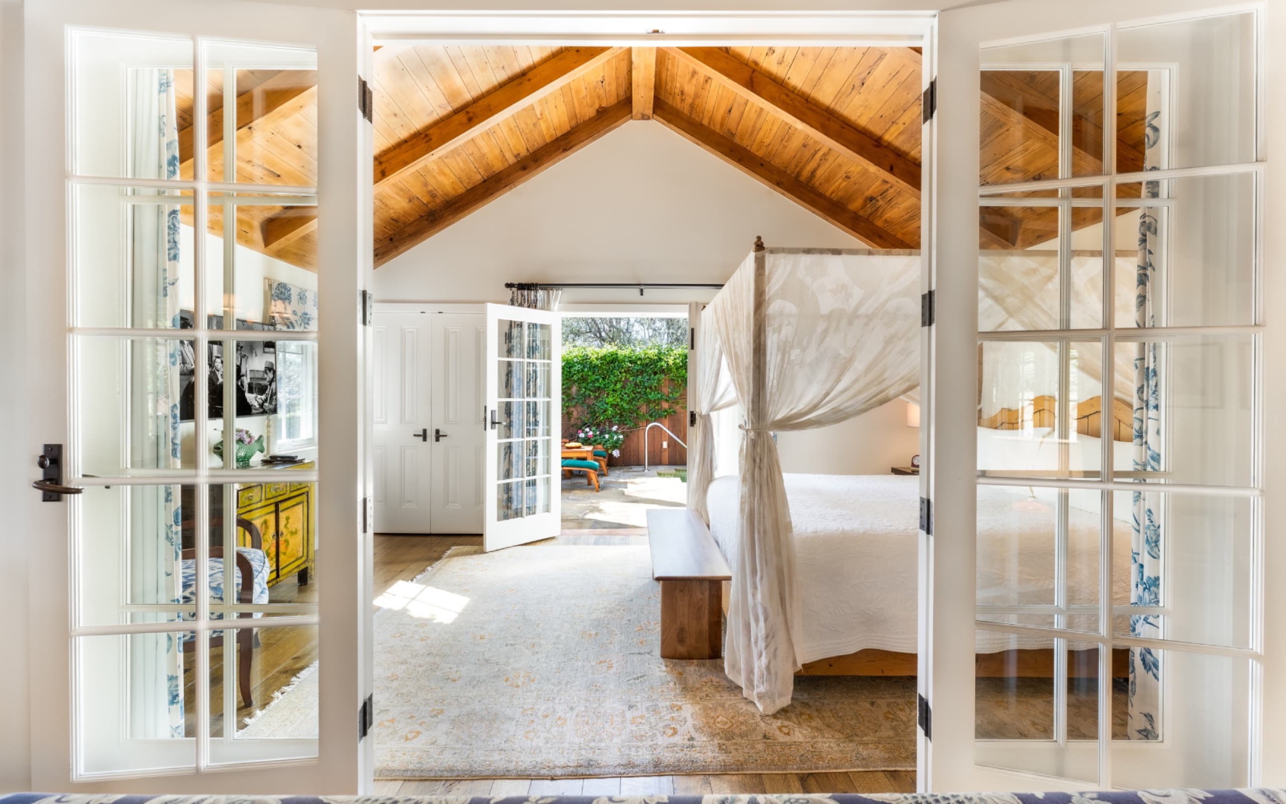 Acacia Cottage - separate bedroom seen through French doors