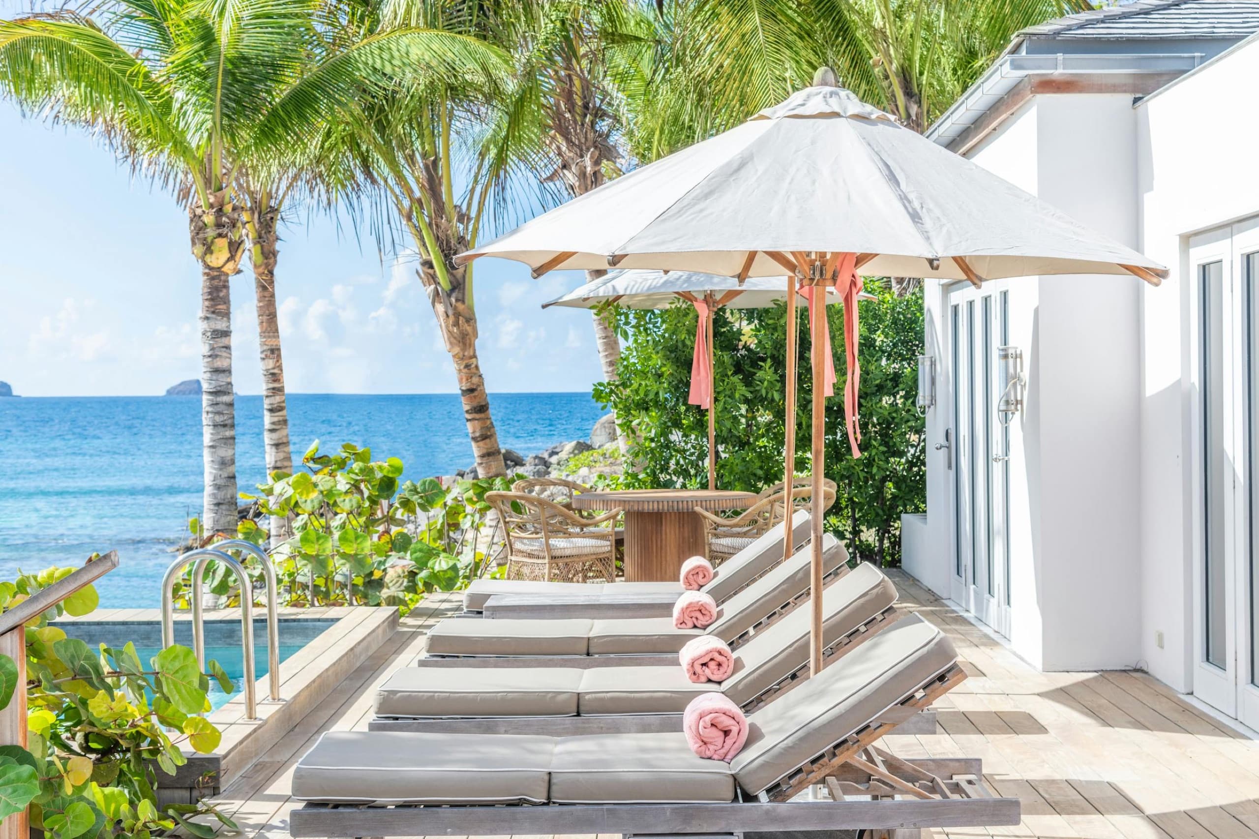 Two-Bedroom Beach Suite terrace with steps straight down to the beach