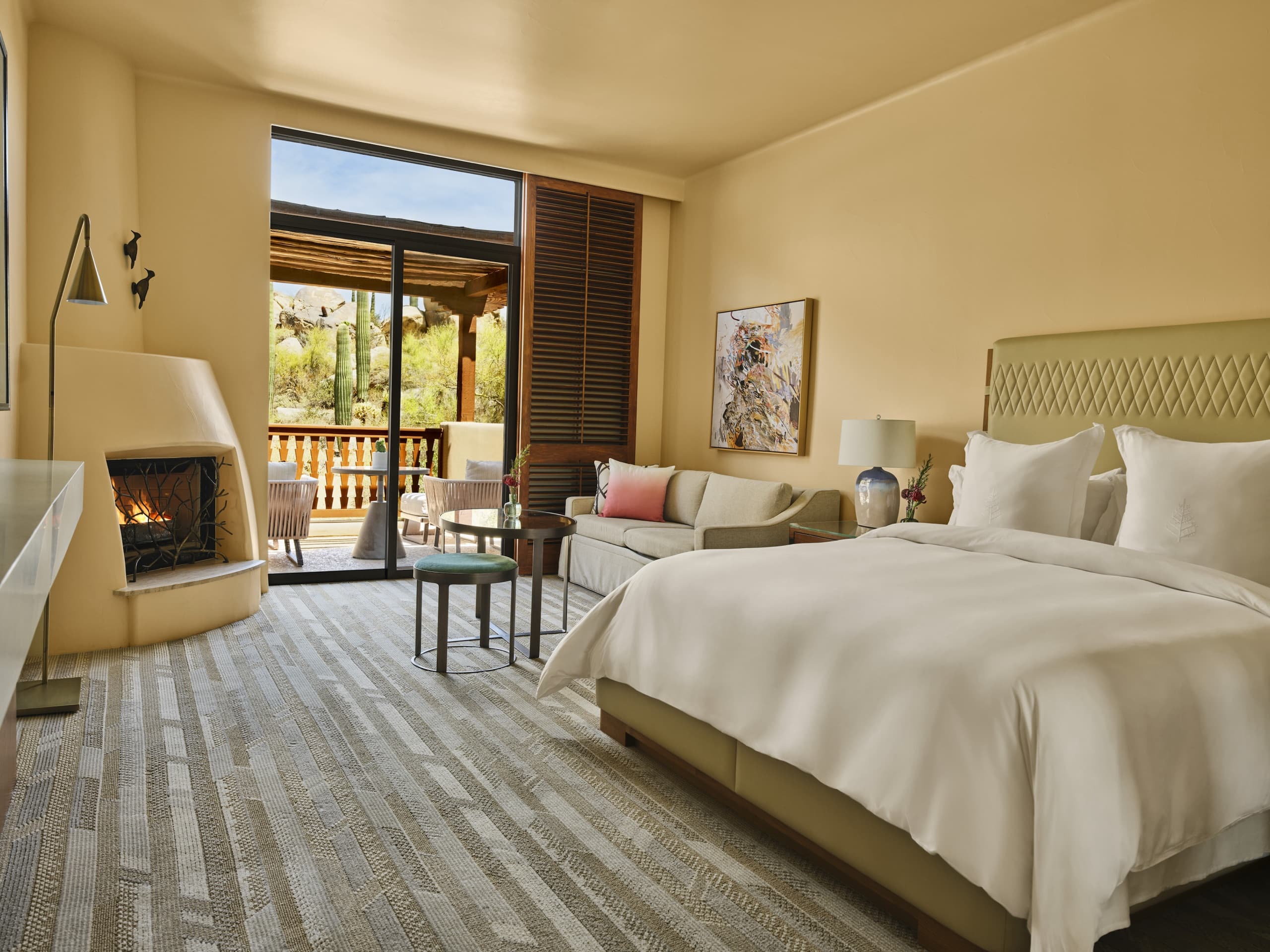 Casita Room — king bed and kiva fireplace