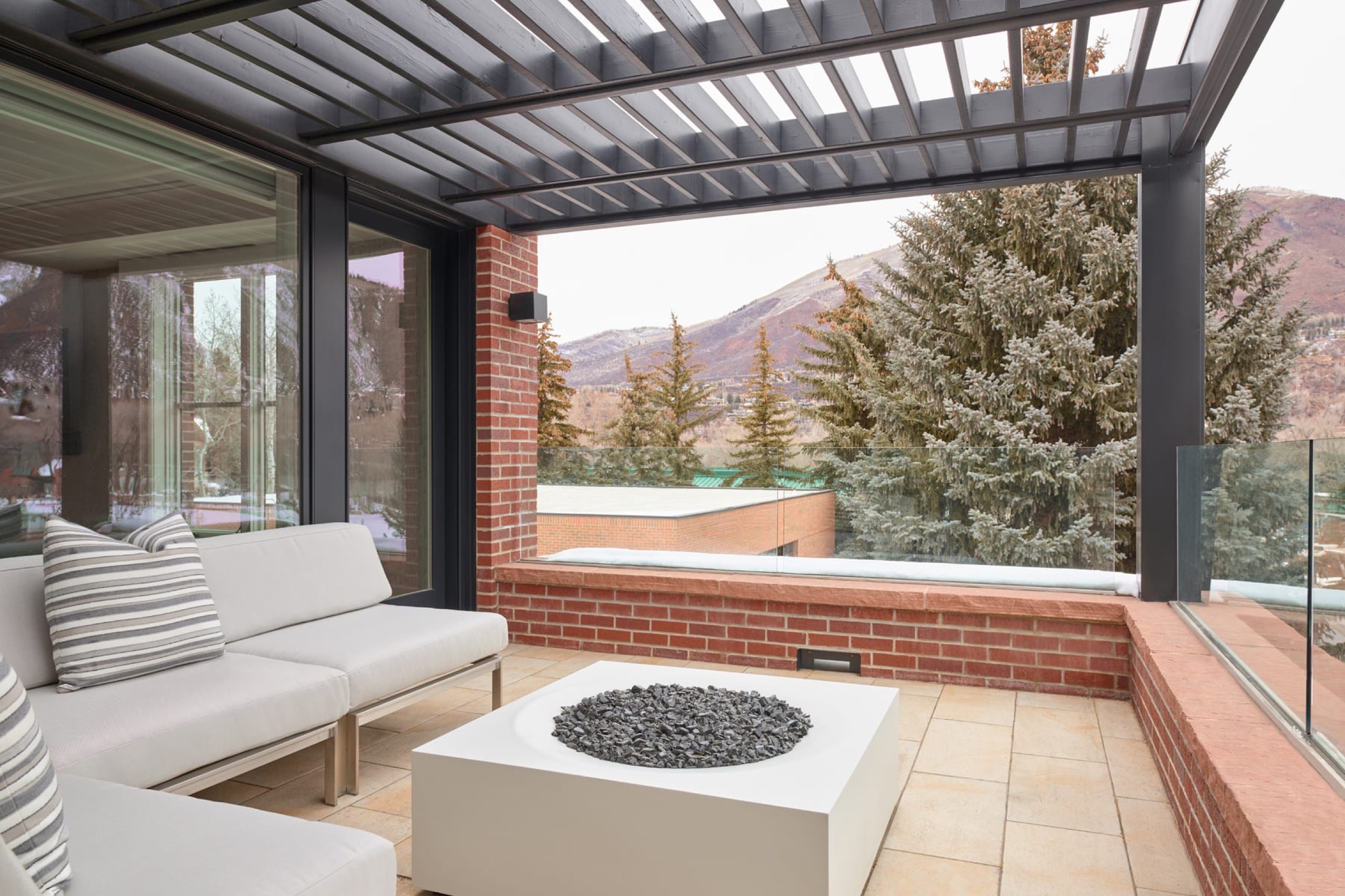 Hotel Jerome Residential Suite living room, 2,041 sq ft, Aspen Mountain through the windows