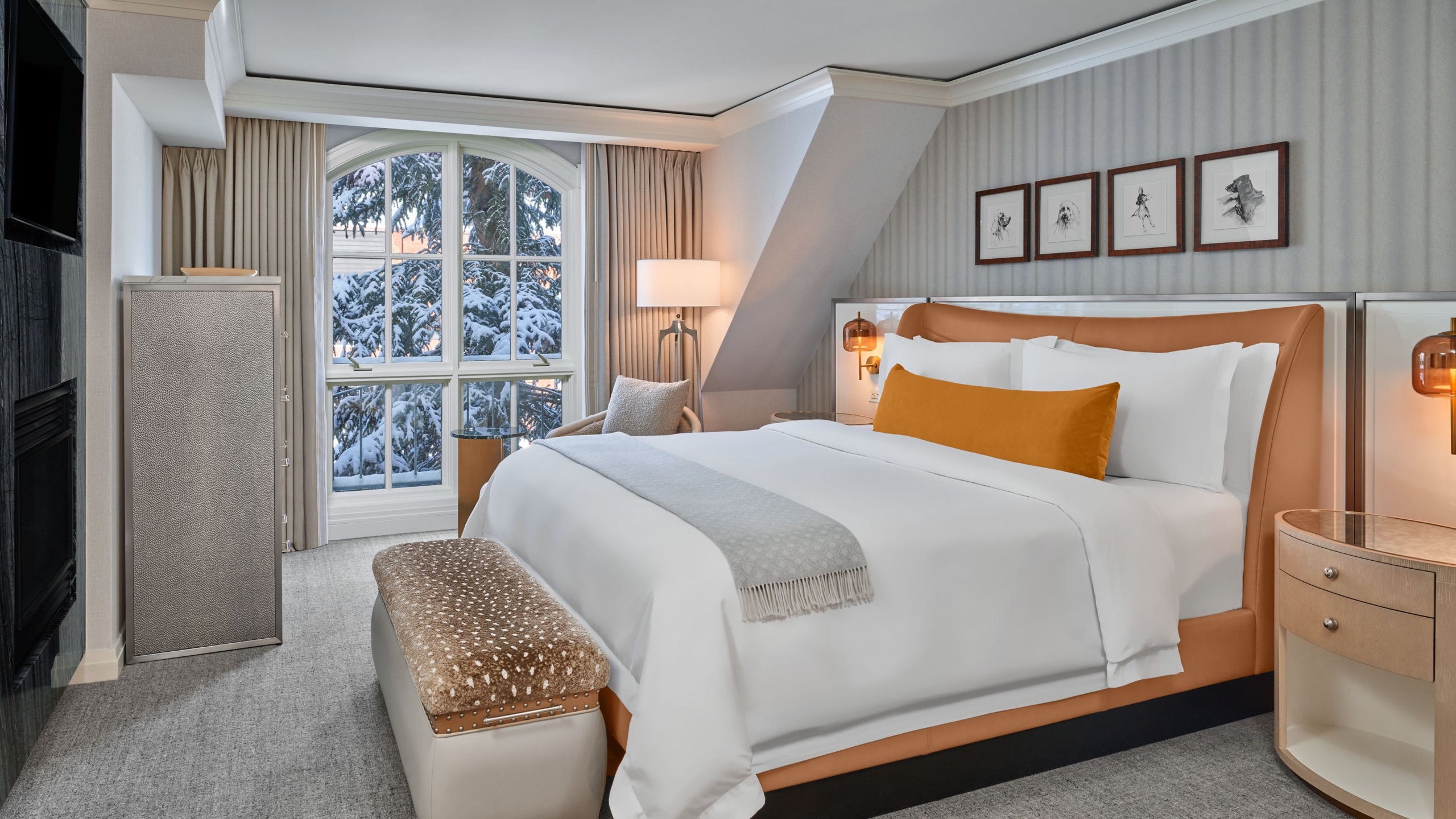 One Bedroom Suite — living room with fireplace and snowy windows