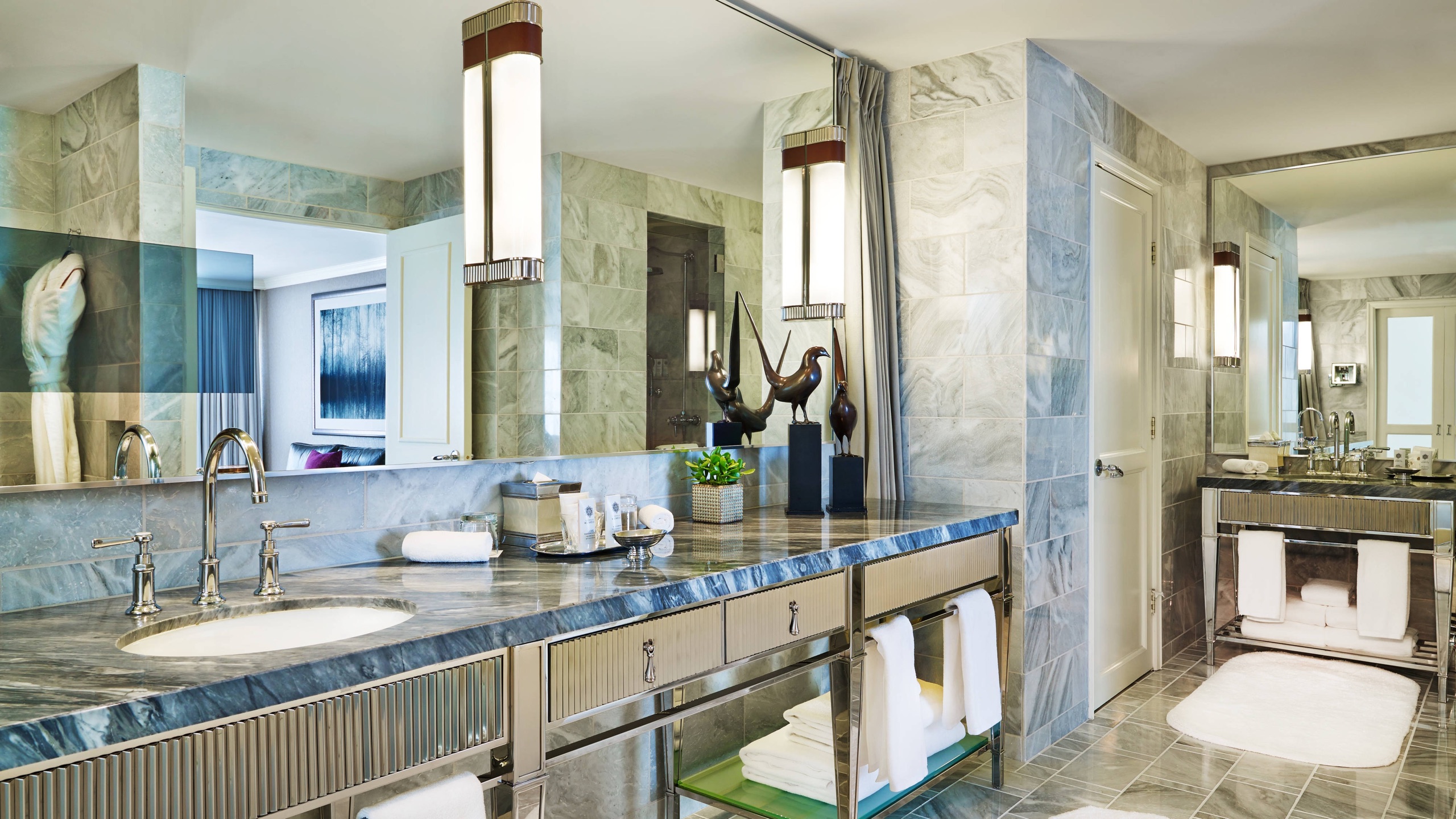 Paradis Suite — living room with baby grand piano