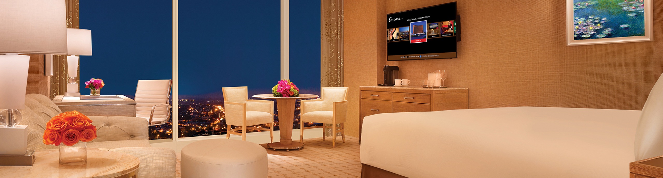 Premier Harbor View King with Boston skyline at night