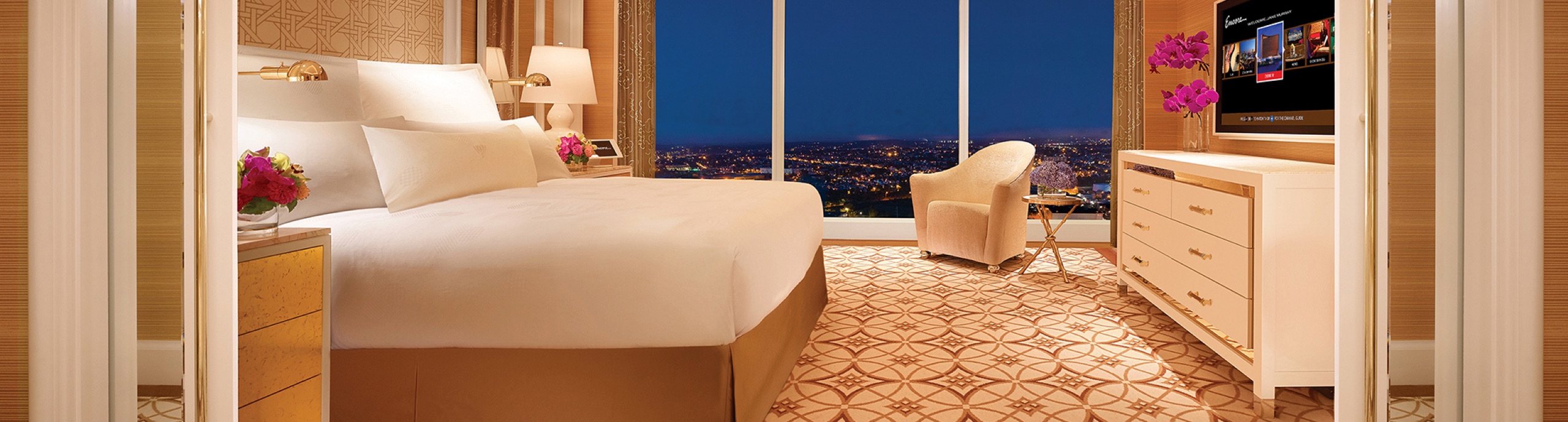 Signature Suite bedroom with skyline view