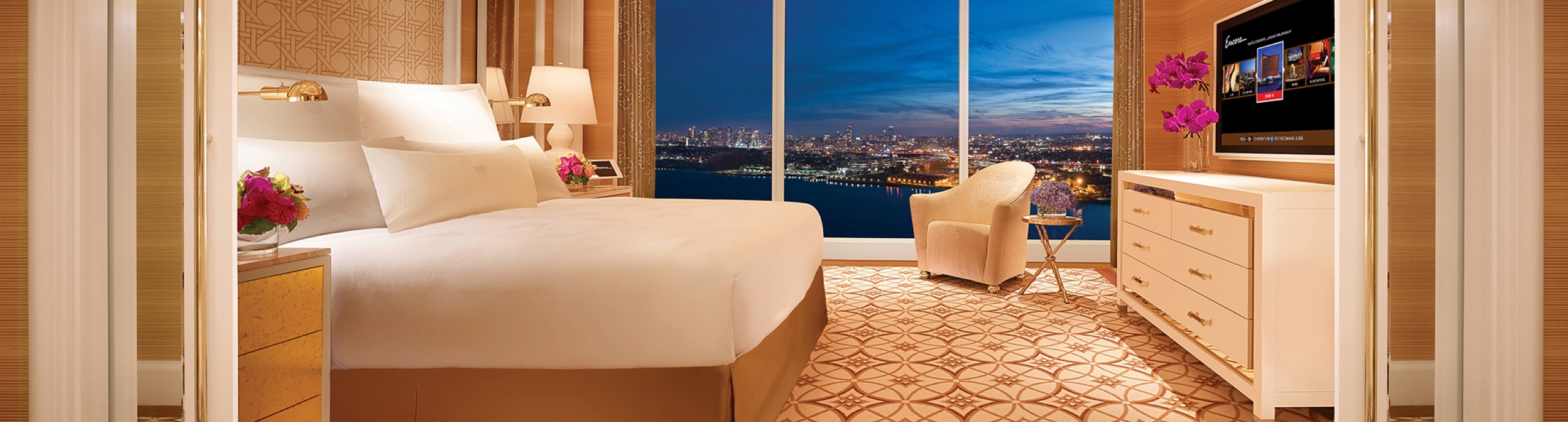 Signature Harbor View Suite bedroom facing the harbor