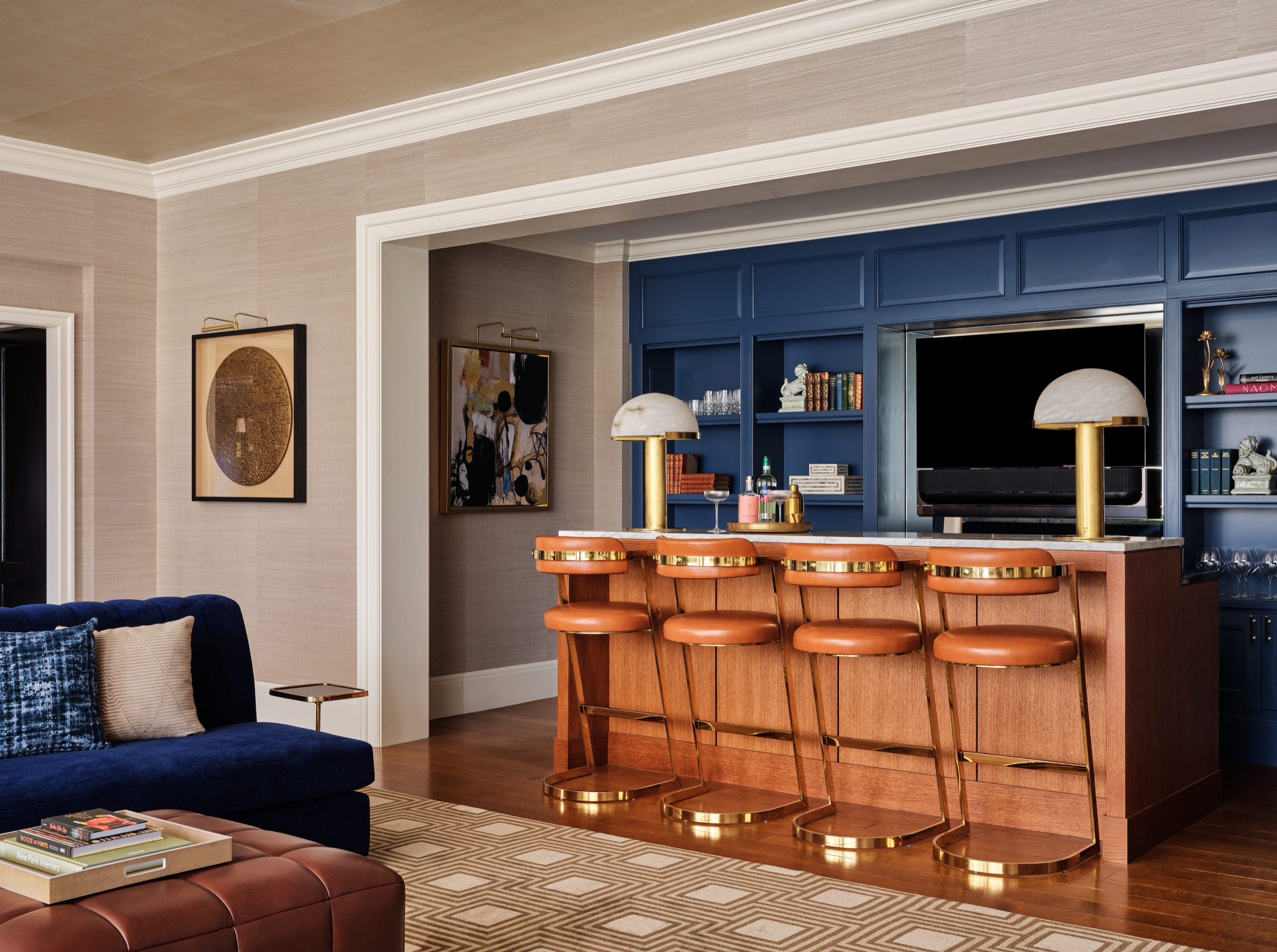 Royal Suite — private dining room with dark wood table, tan leather chairs and gilded ceiling