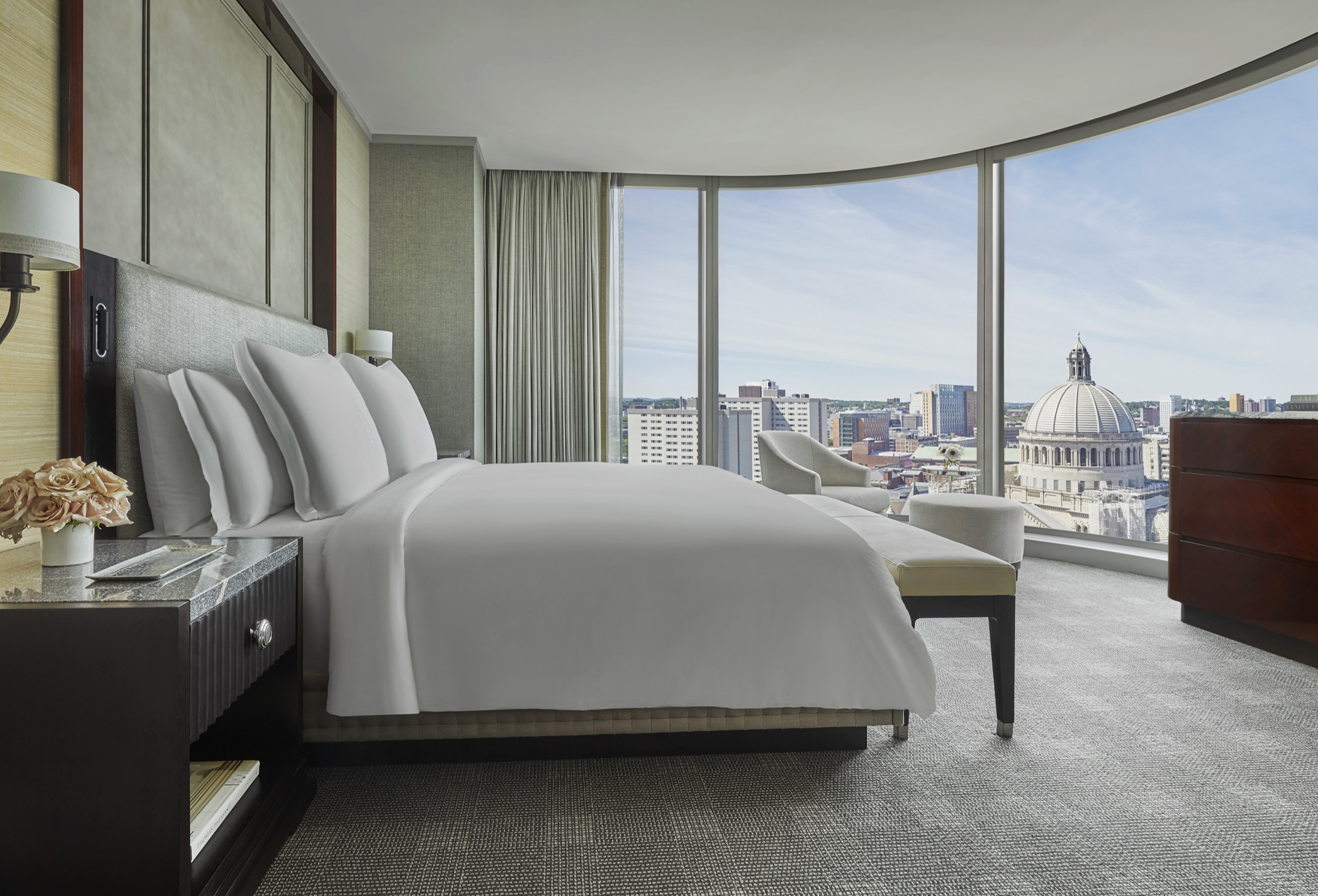 Corner Suite living room with wraparound city views