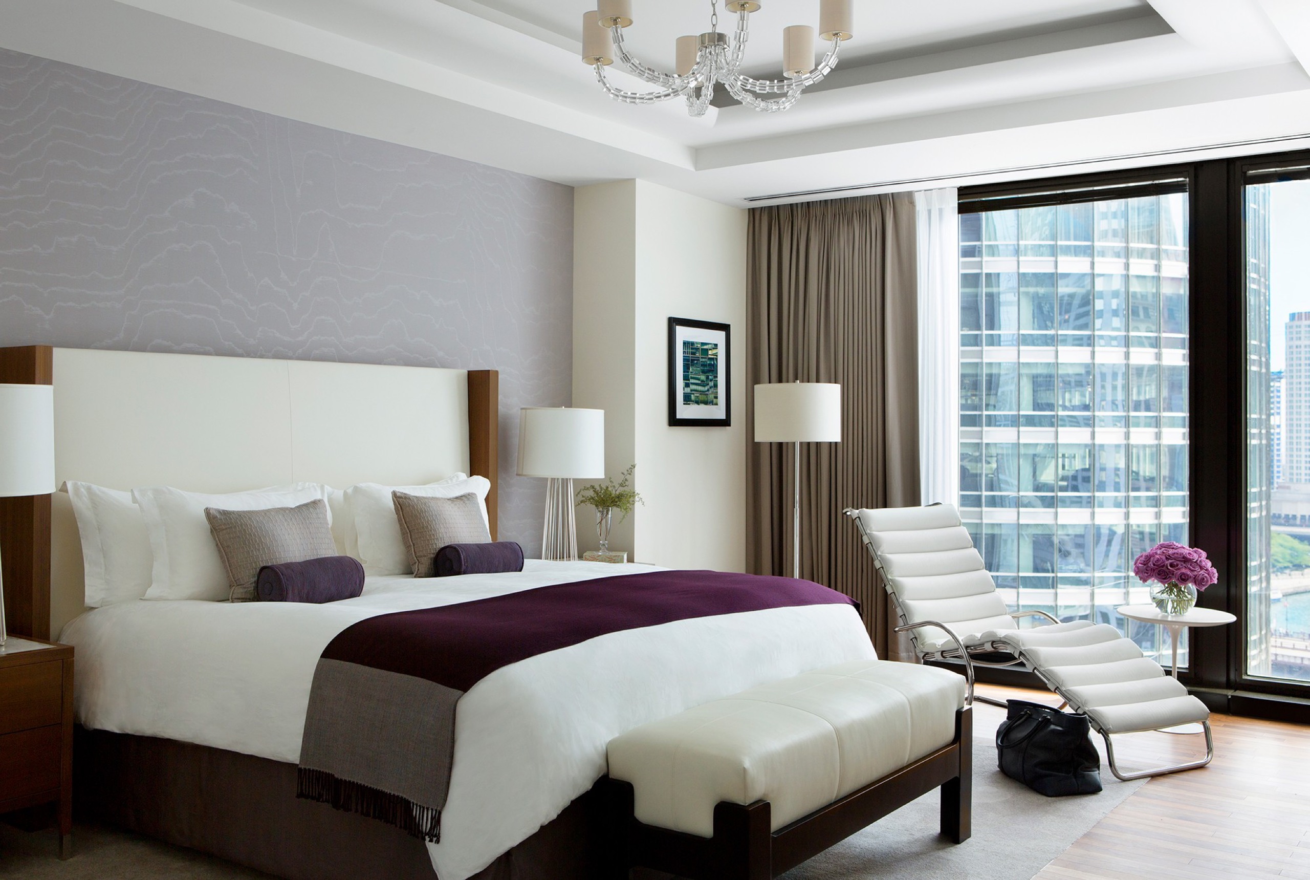One Bedroom Lake View Suite — living room with daybed and river/lake outlook