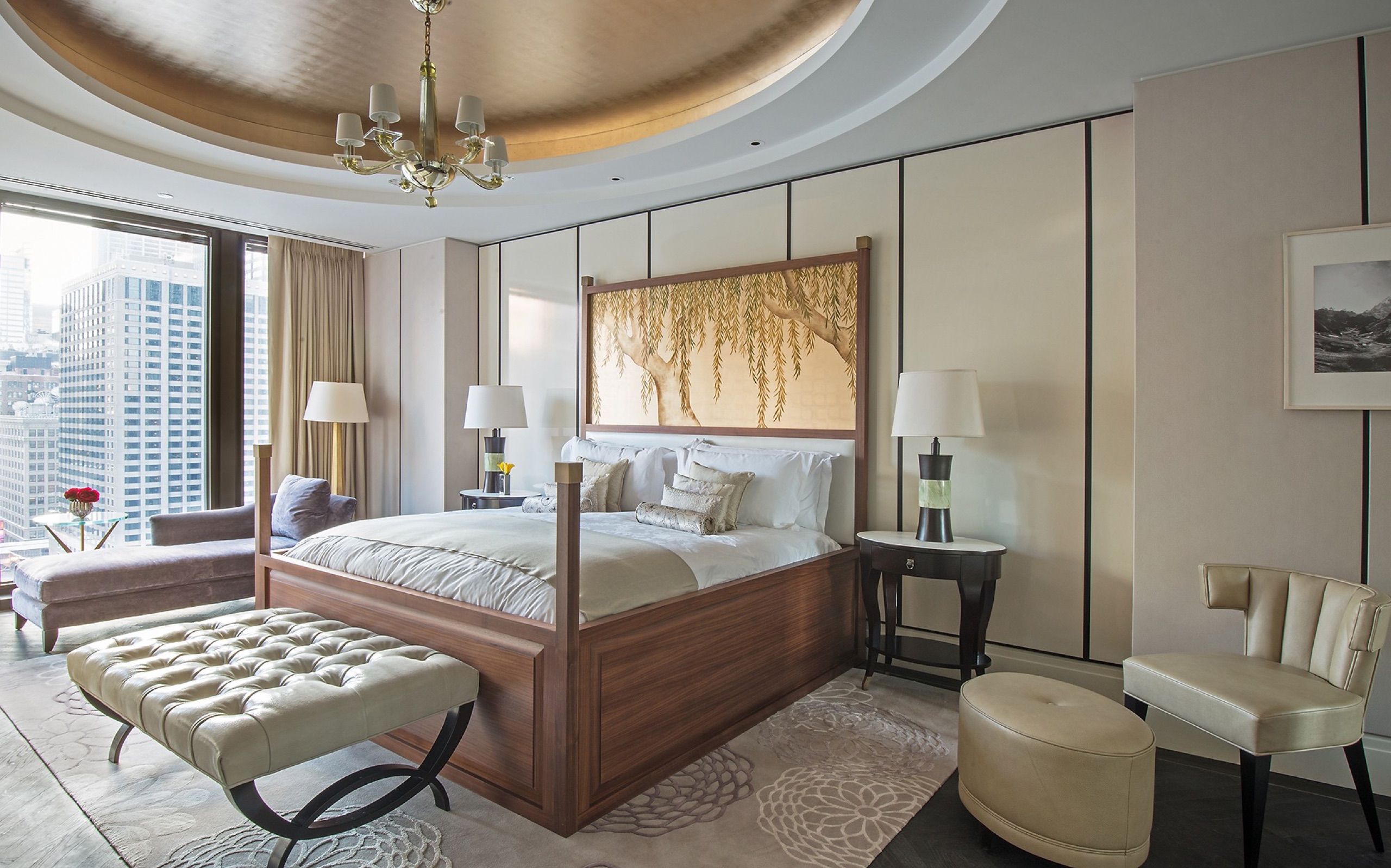 Regent Suite — parlor with wraparound river-view windows