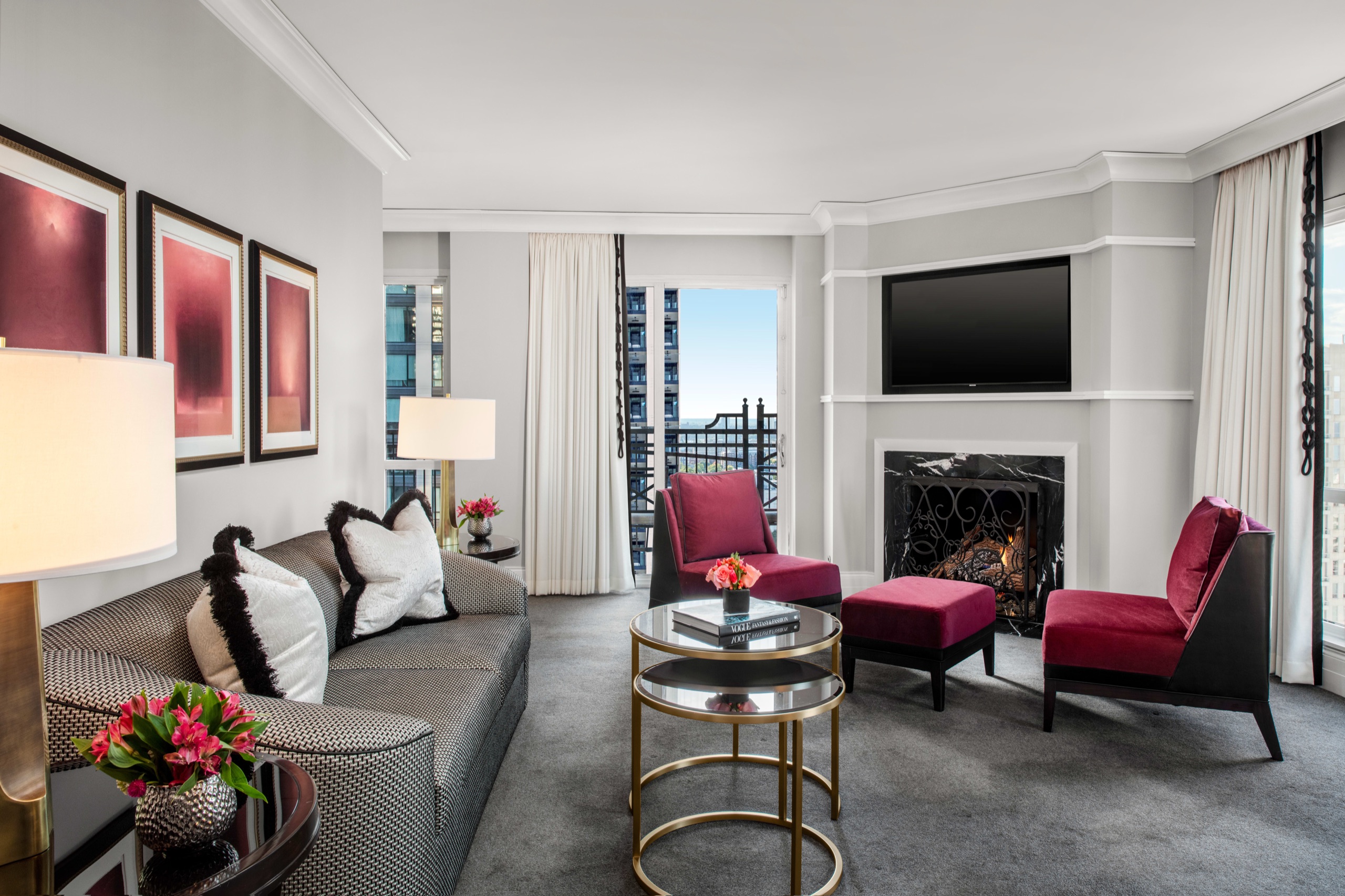 Gold Coast Suite — living area with fireplace and terrace view