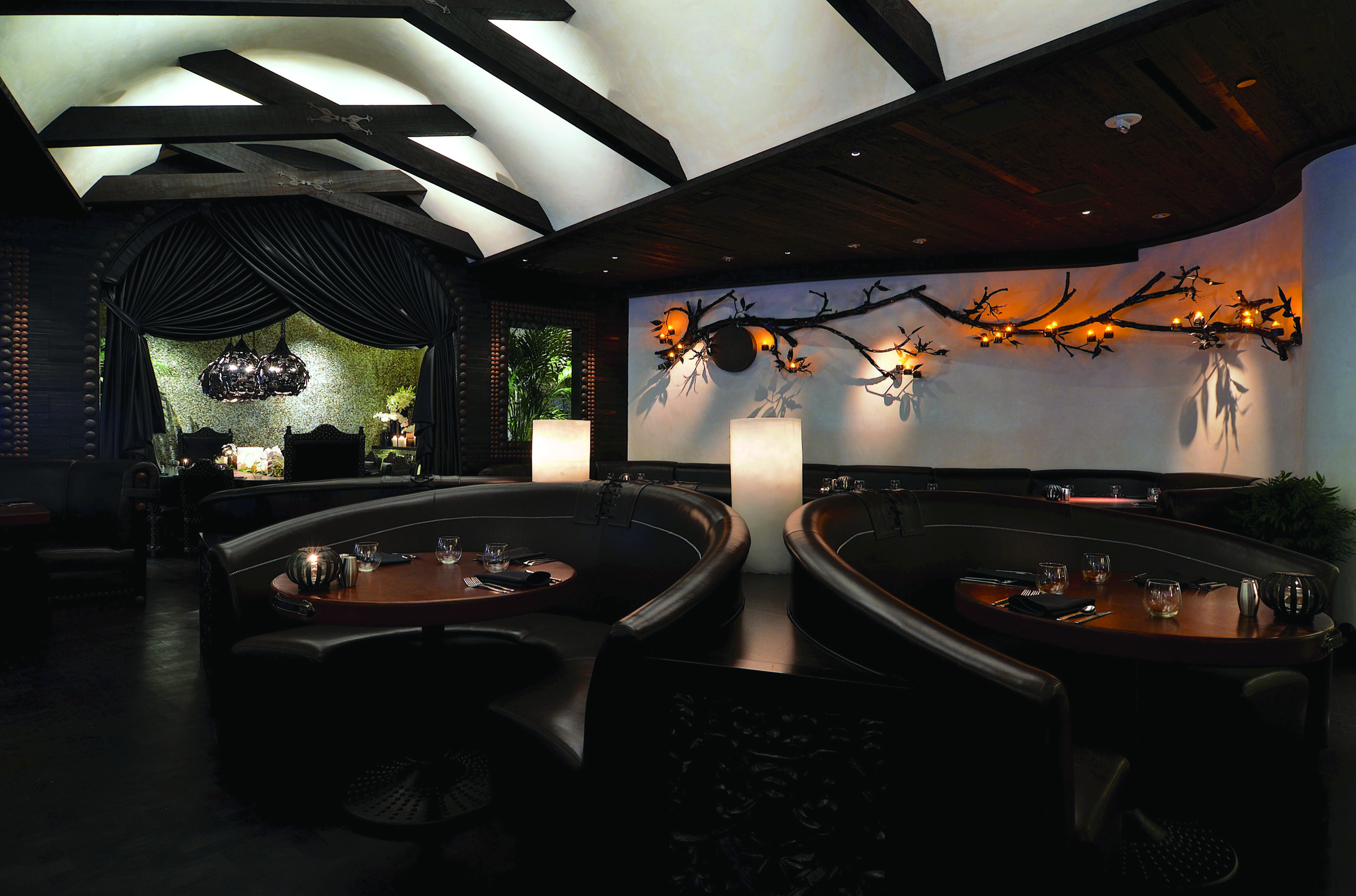Carbone — main dining room with checkerboard marble floor and bar