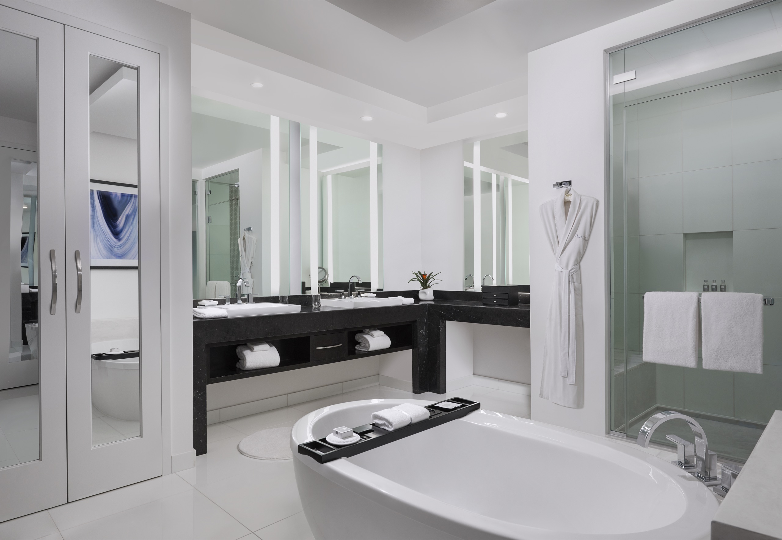 ARIA Sky Suites Two Bedroom — living and dining area with daytime mountain and Strip view