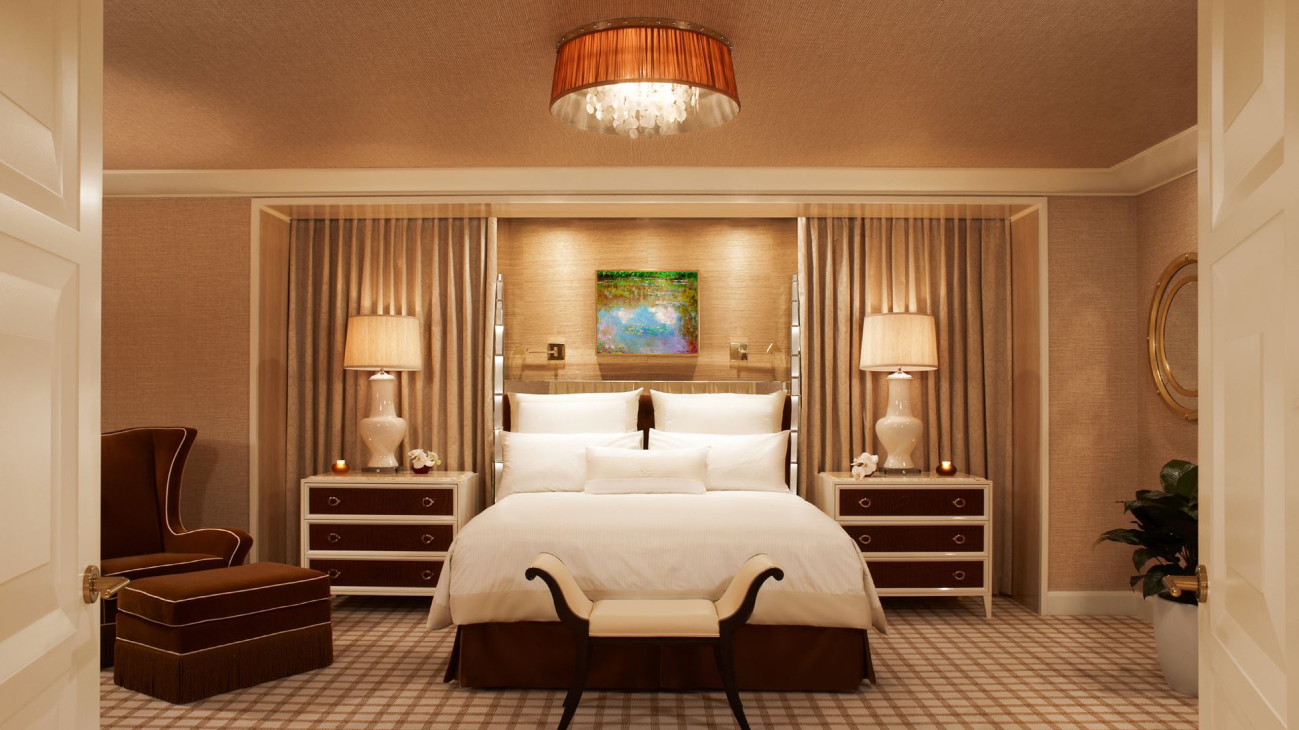 Encore Salon Suite — oval living room with panoramic windows