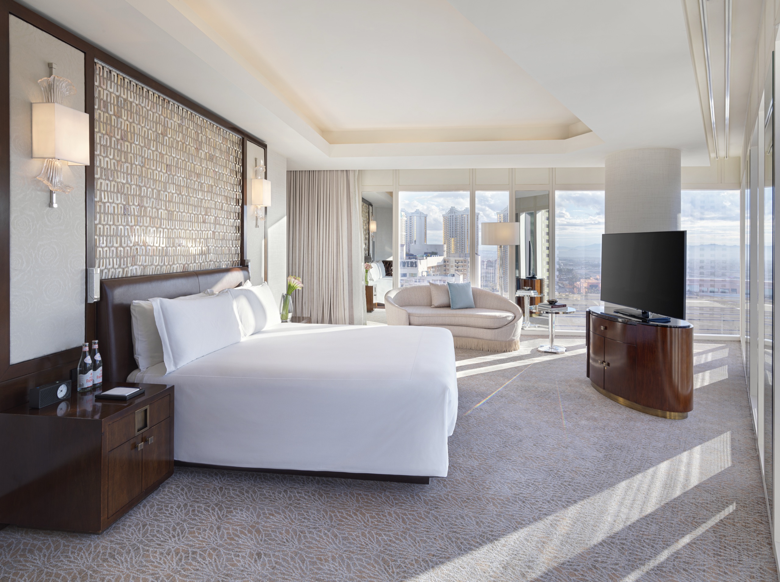 Penthouse Panorama Strip View Suite - master bedroom with wraparound windows (2024)