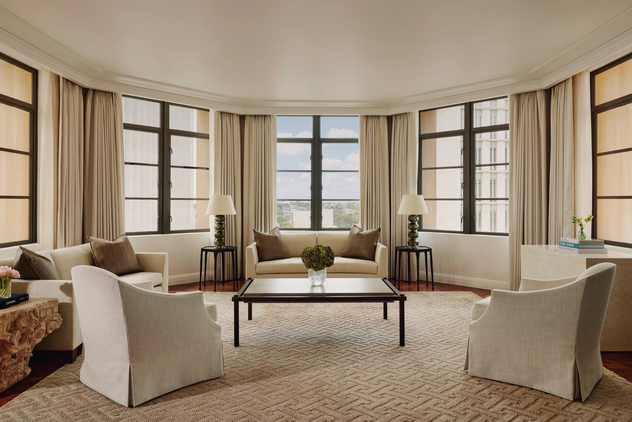 Maybourne Presidential Suite - grand living room with piano and fireplace (2,025 sq ft)