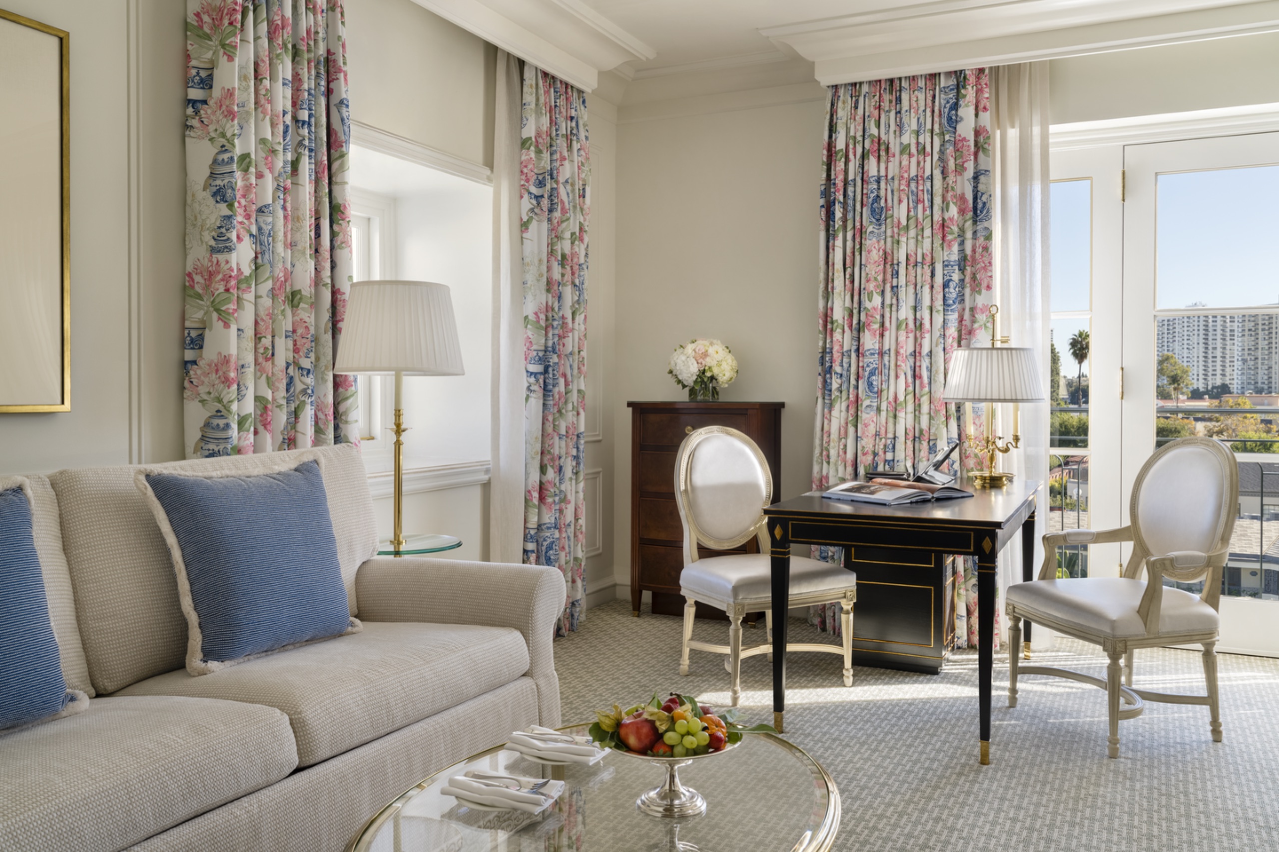 Premium Grand Deluxe Room - sitting area with chinoiserie floral drapes, black-lacquer writing desk and French doors onto the balcony (2025 redesign)
