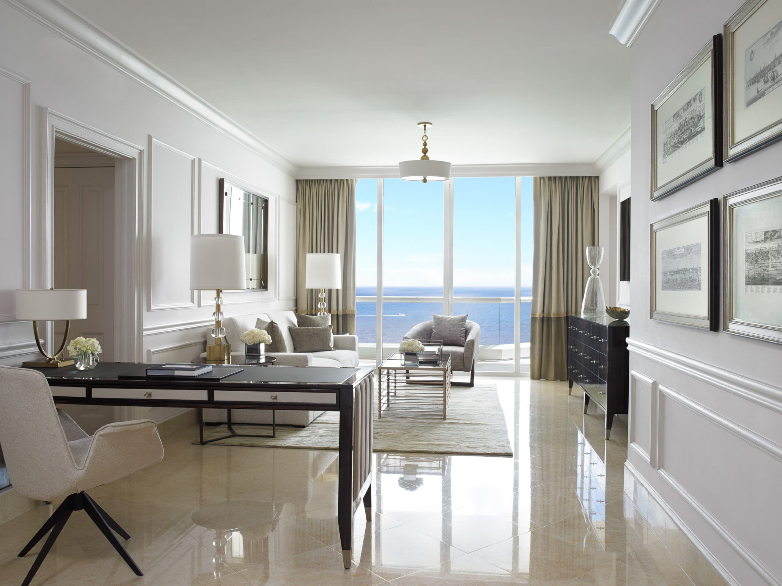 Deluxe One Bedroom Oceanfront Suite living room and desk