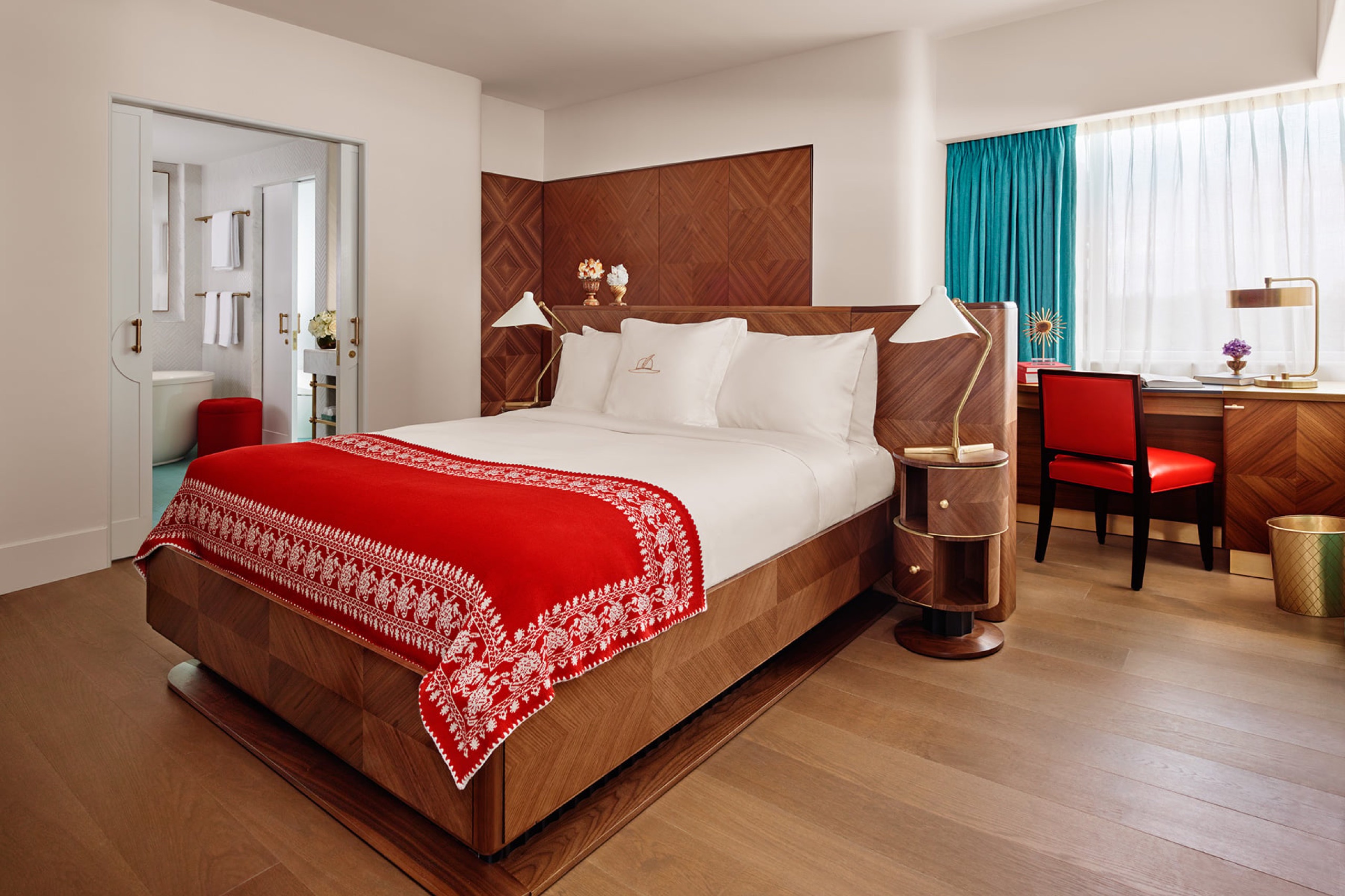 Bay View Queen Junior Suite - bedroom with marquetry headboard and writing desk