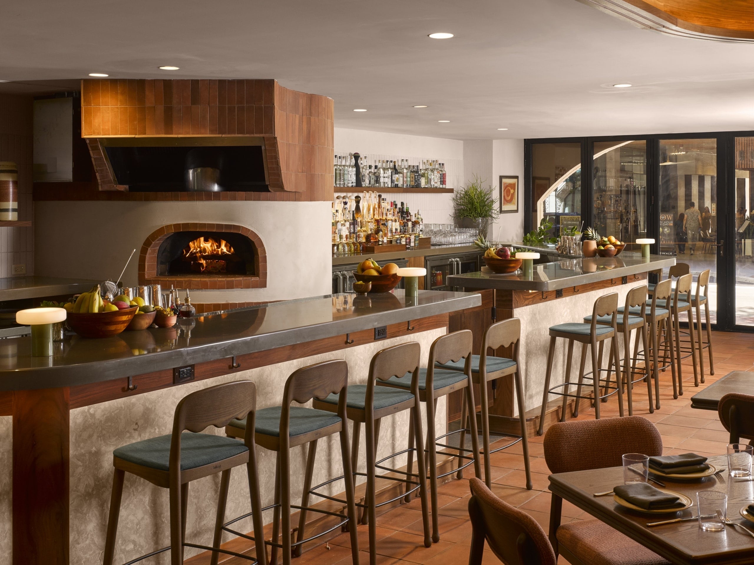 Mayfair Grill dining room with wood-fired oven and bar