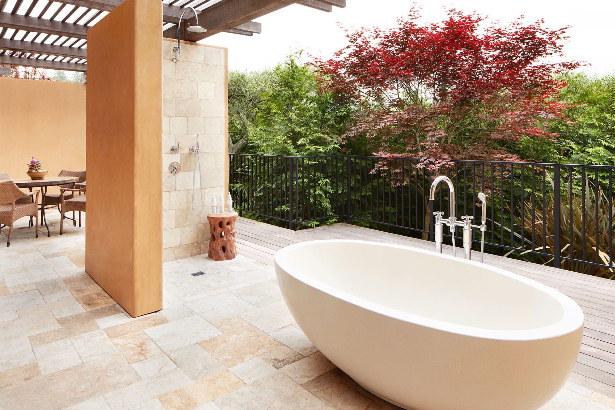Deluxe Private Garden Suite sitting area with outdoor soaking tub