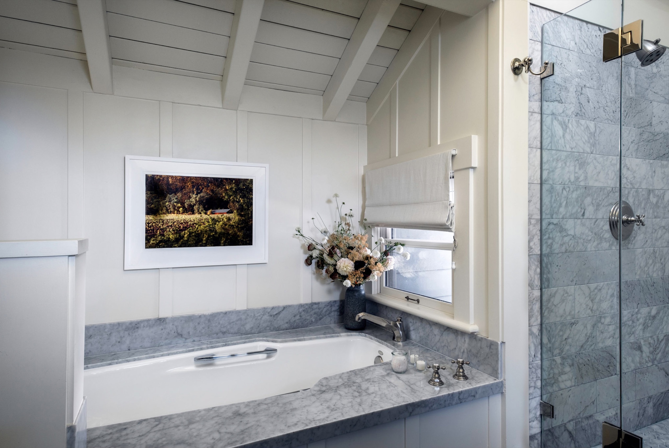 Oakview Room bathroom with corner soaking tub and glass shower
