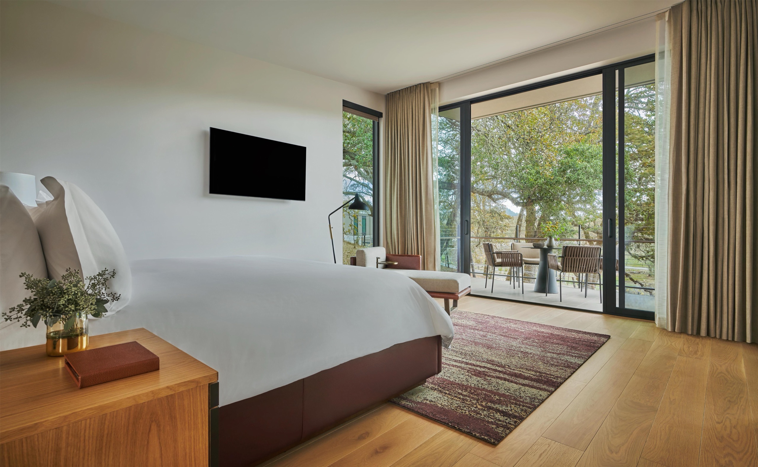 Deluxe Vineyard One Bedroom Suite bedroom opening to terrace