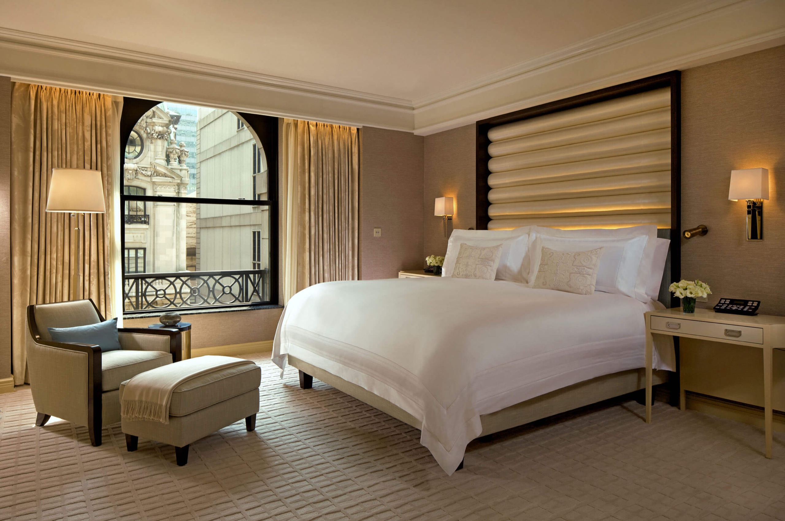 The Peninsula Suite - master bedroom with Fifth Avenue church-spire view