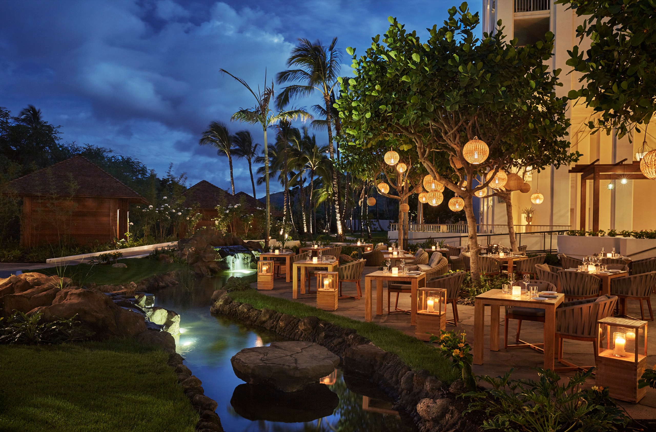 Noe - Italian dining in the lantern-lit garden at night