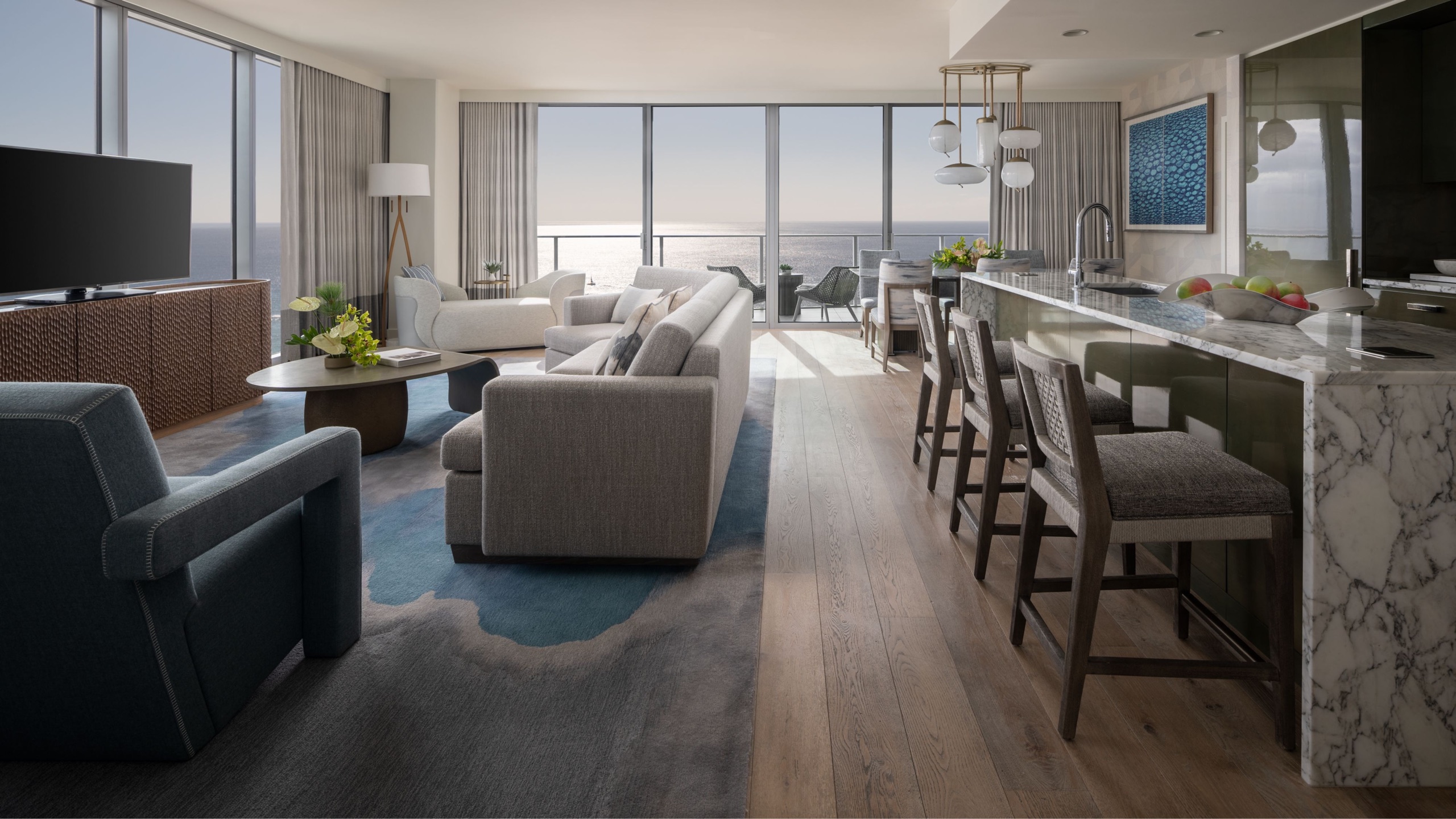 The Ritz-Carlton Suite Collection, living room and gourmet kitchen (Four-Bedroom / Three-Bedroom signature suite, 'Ewa Tower)