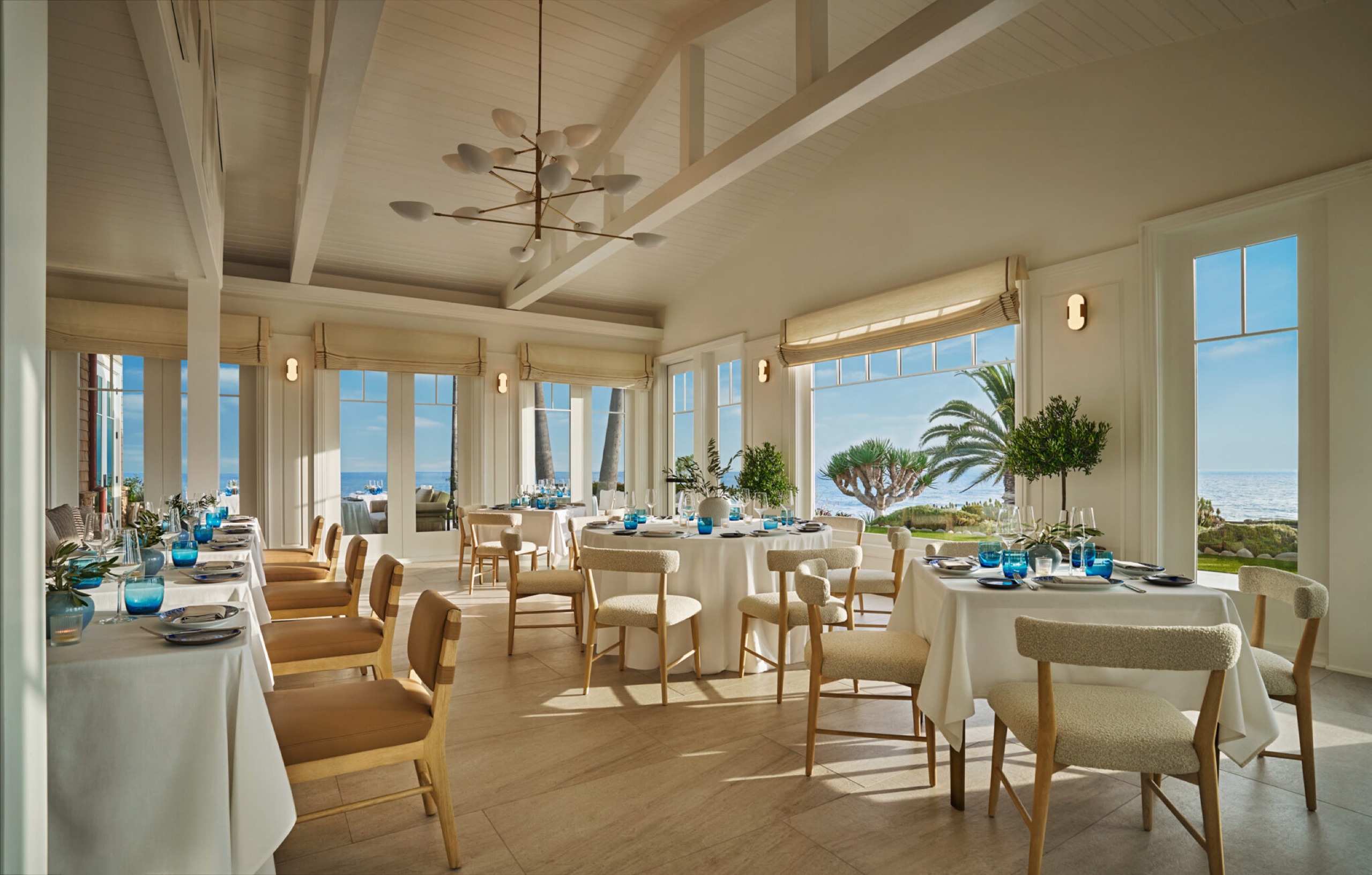 Studio Mediterranean — dining room with ocean-facing windows