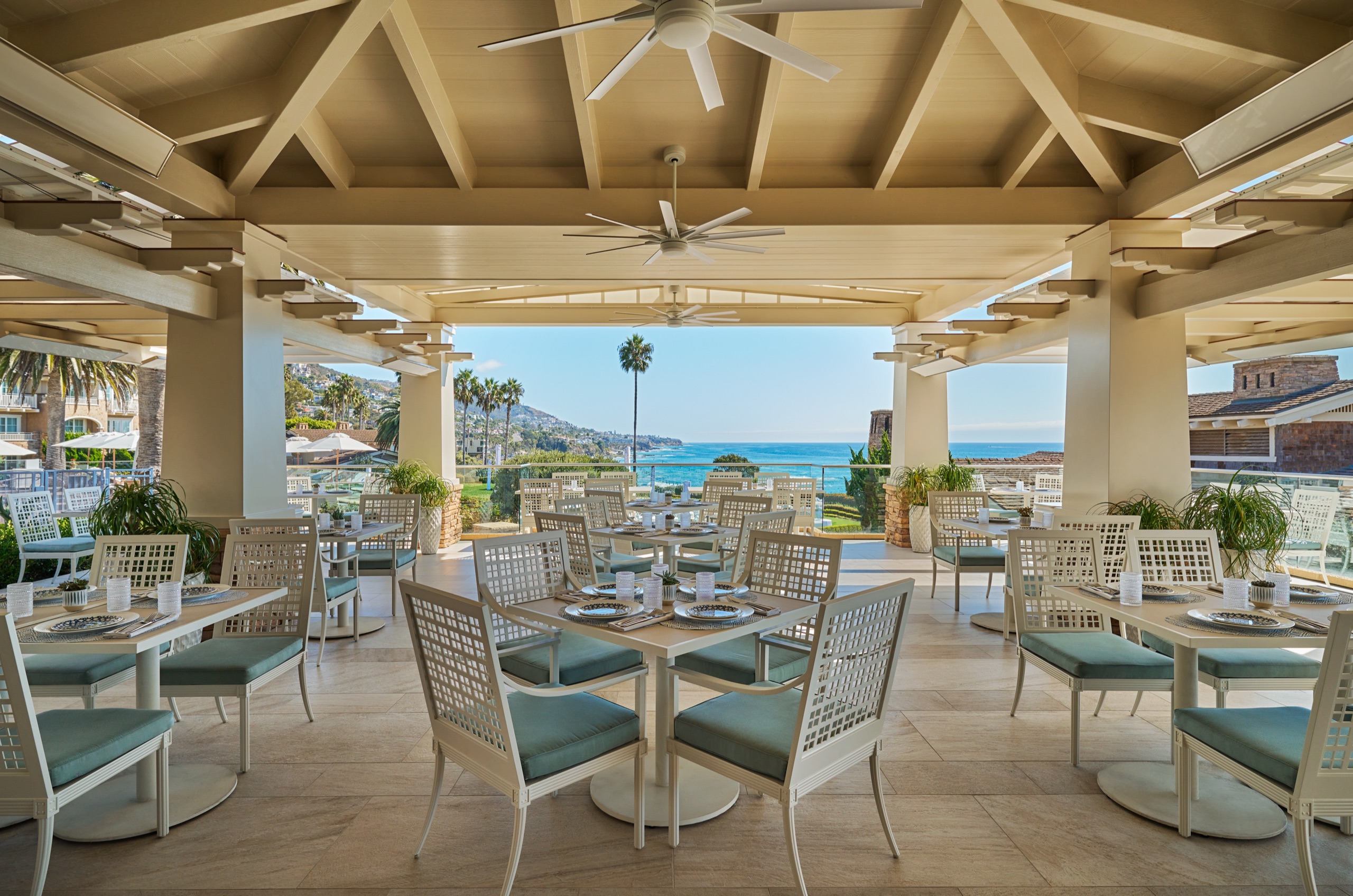 Mosaic Bar & Grille — covered poolside terrace with ocean view