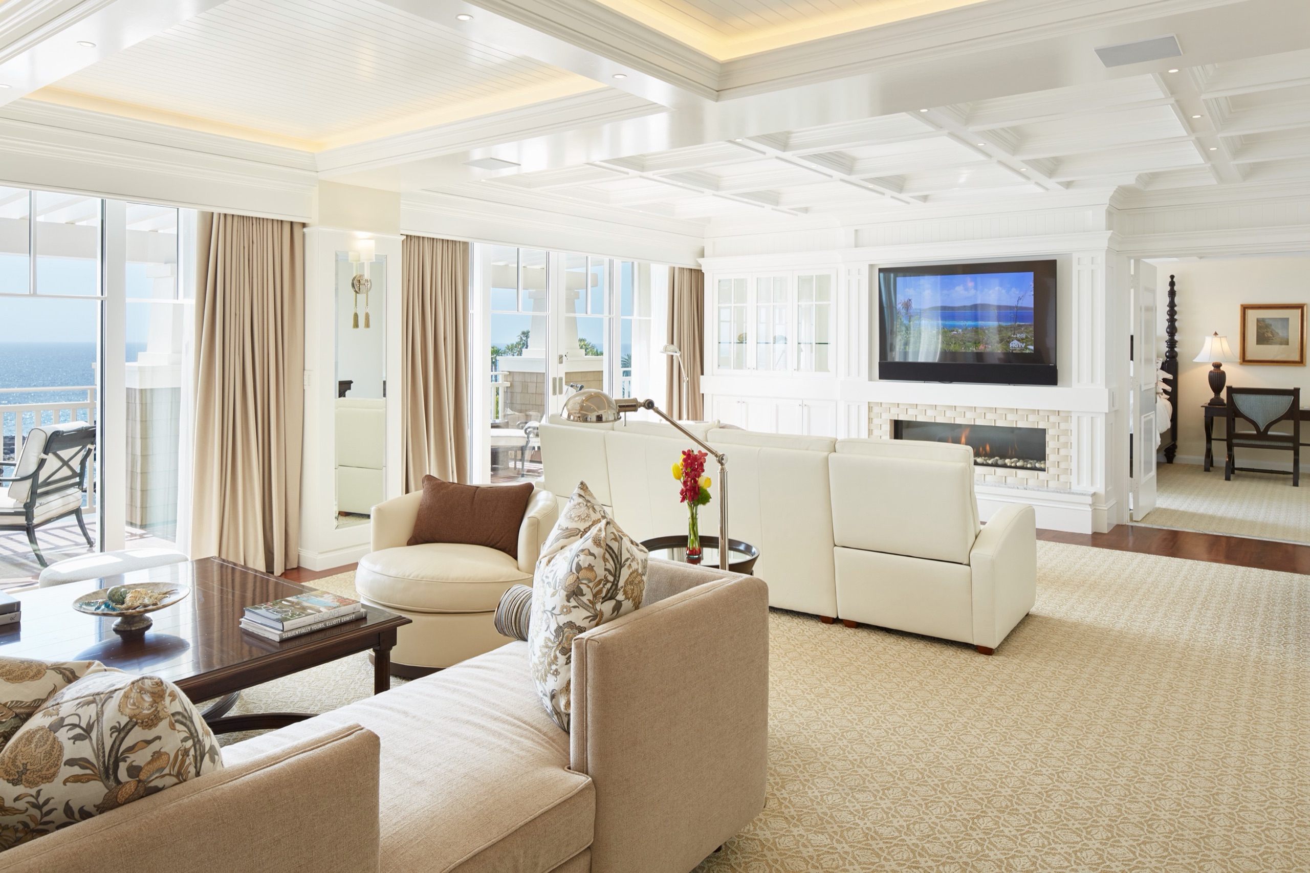 Catalina Suite — living room with fireplace and wraparound ocean terrace