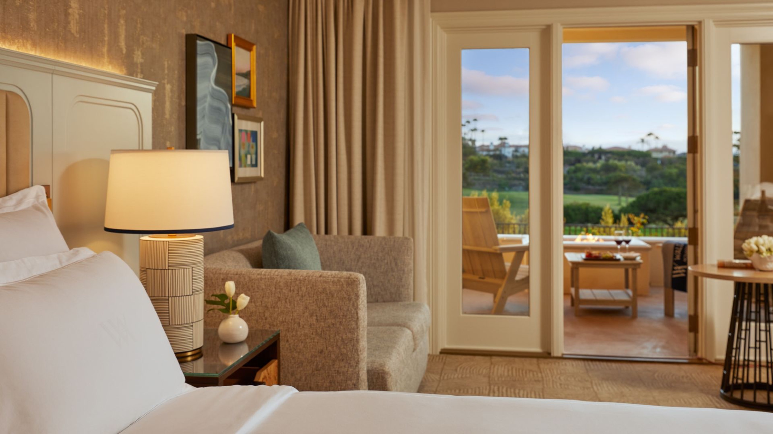 Fireside Terrace Room - king bed, sitting area, terrace fire pit with golf-course view