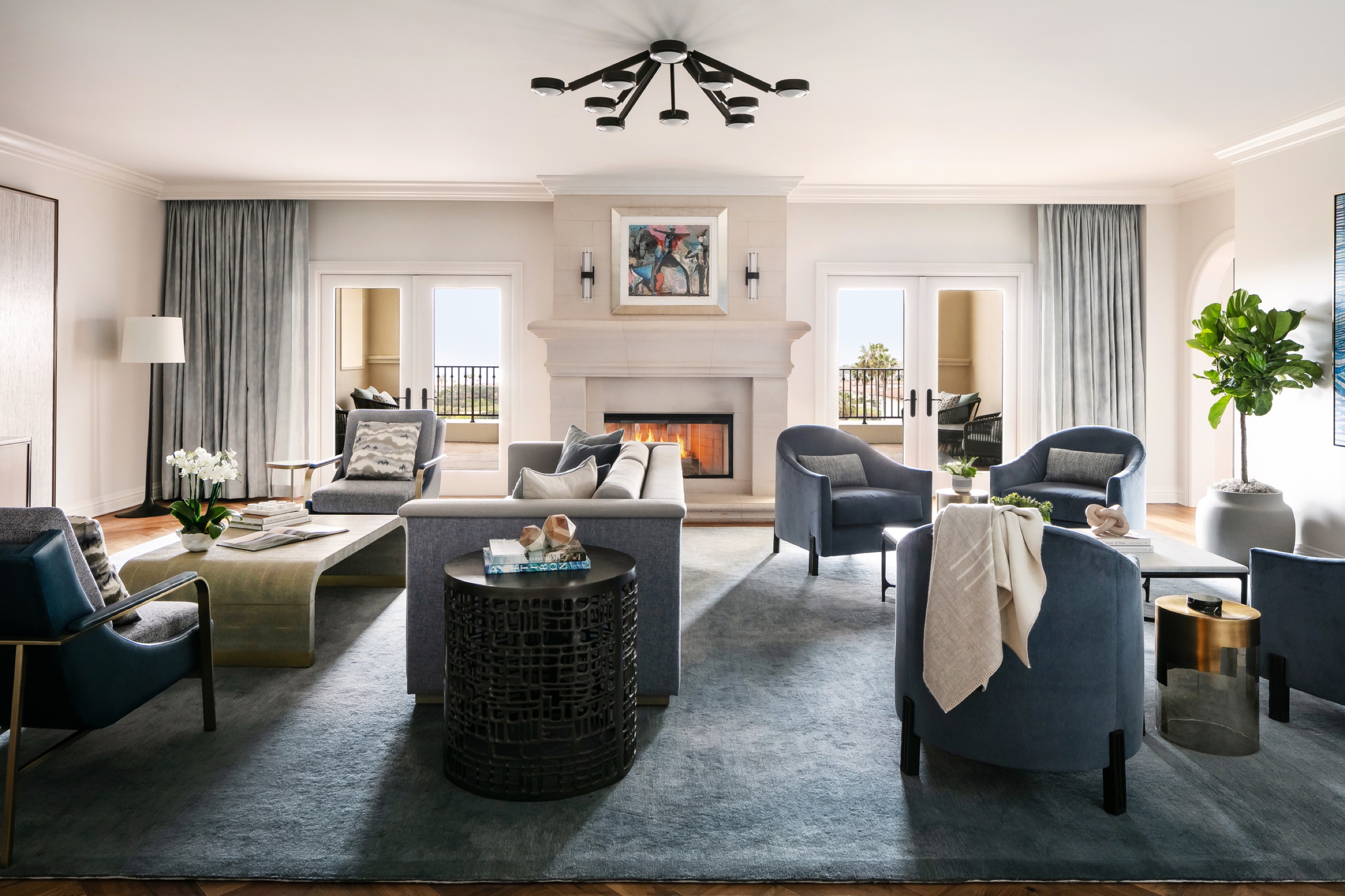 Penthouse Suite - living room with fireplace and ocean-view terrace doors