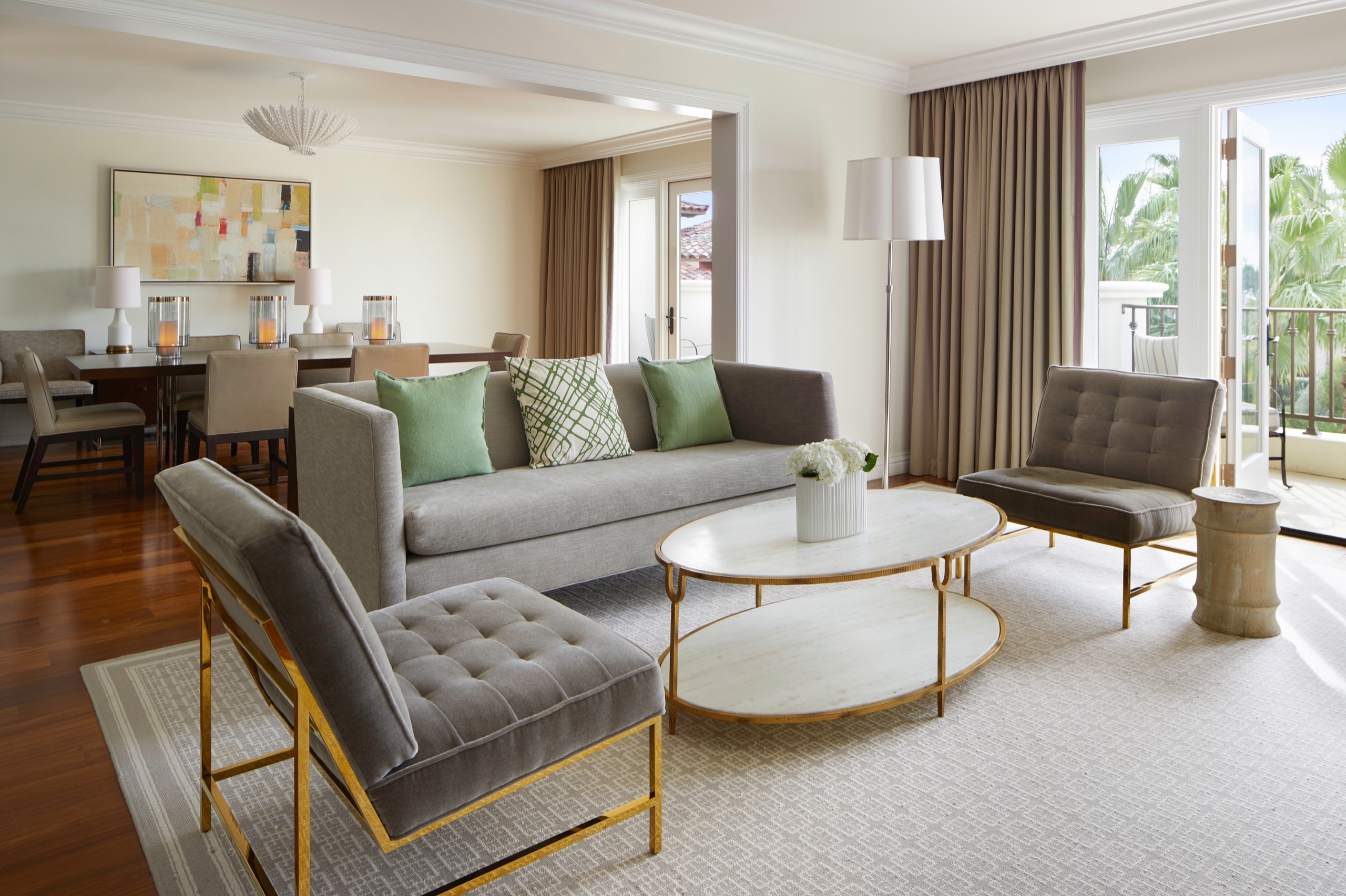 Suite living and dining room opening to a terrace