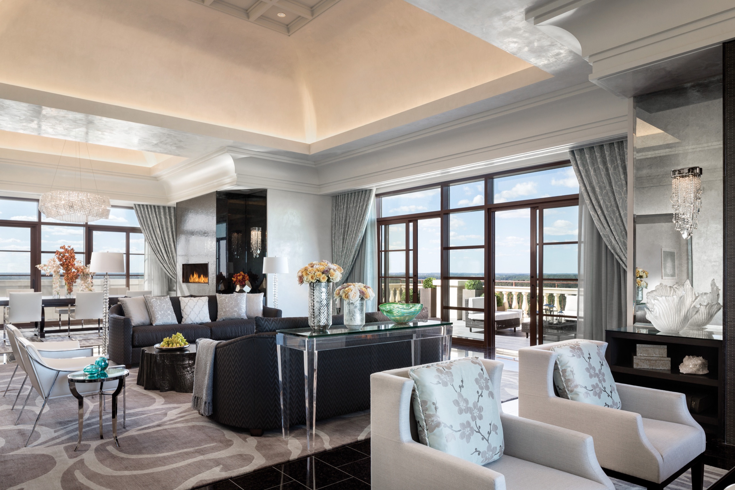 Royal Suite, double-height living room with floor-to-ceiling corner windows