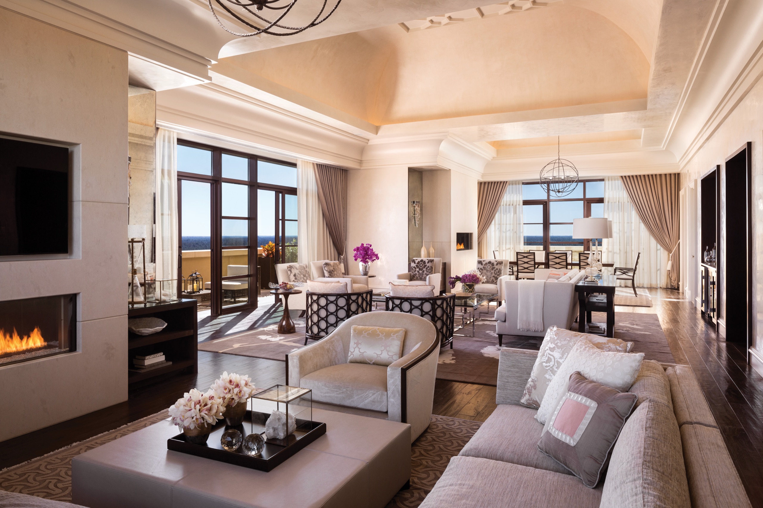 Presidential Suite, living room with fireplace and dining room