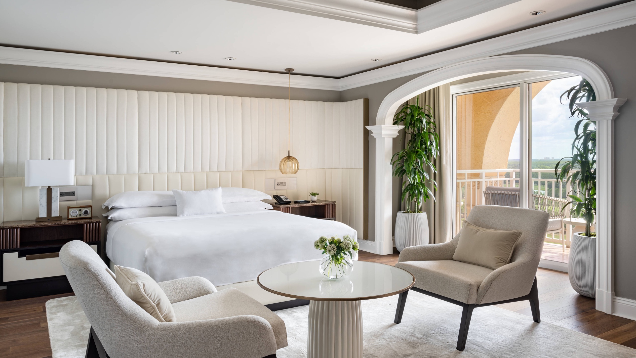 Presidential Suite master bedroom with arched balcony alcove