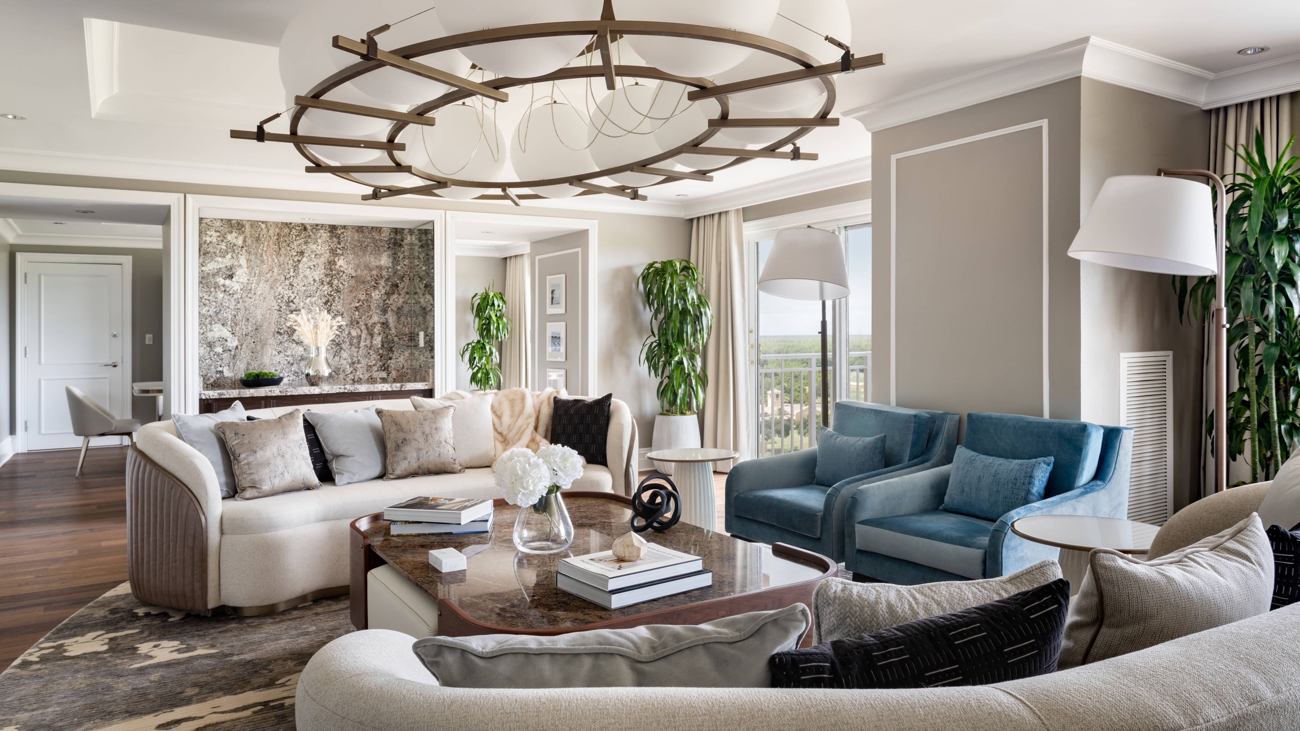 Royal Suite living room with sculptural chandelier