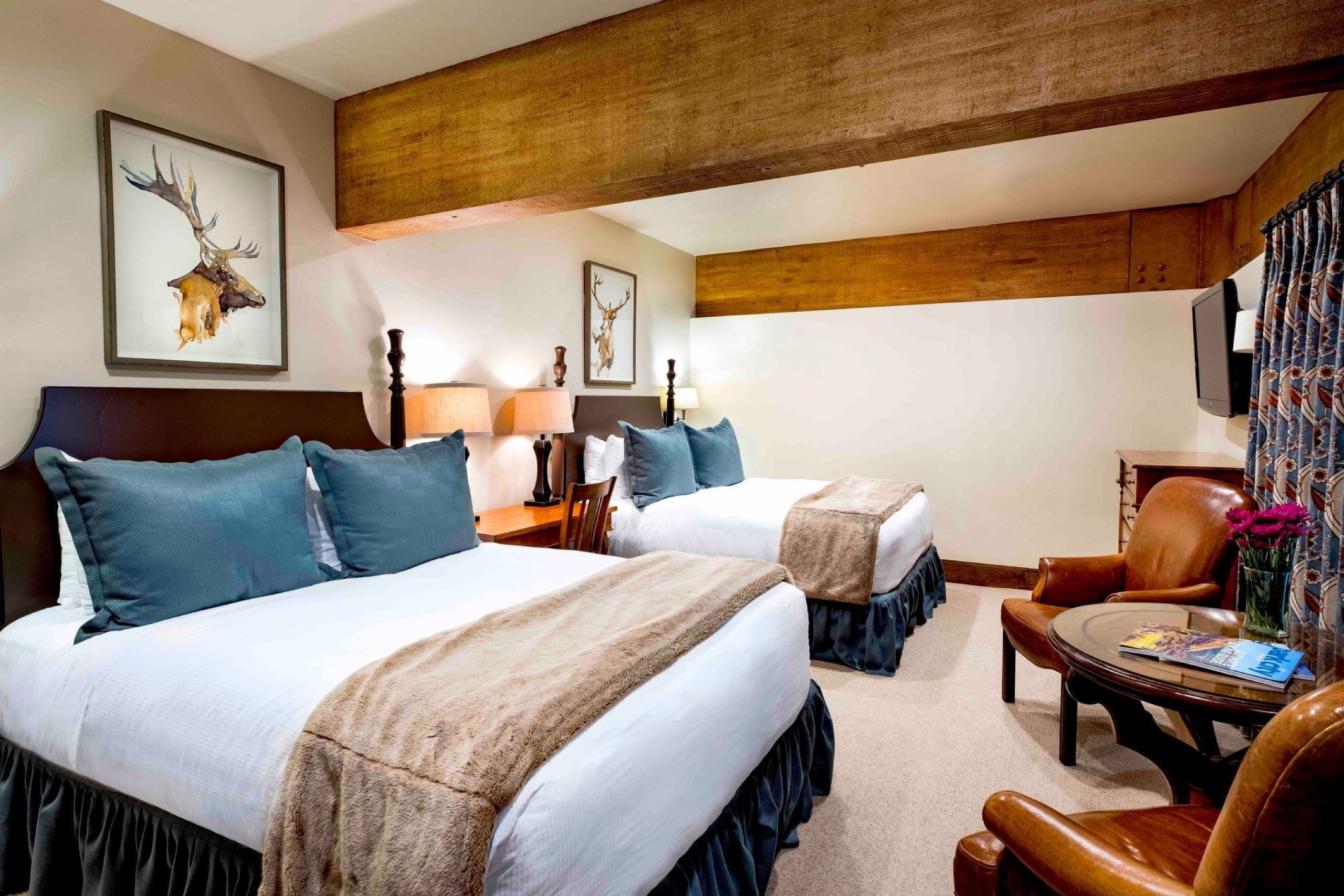 Deluxe King bedroom with gas fireplace and fur throw (room 172)